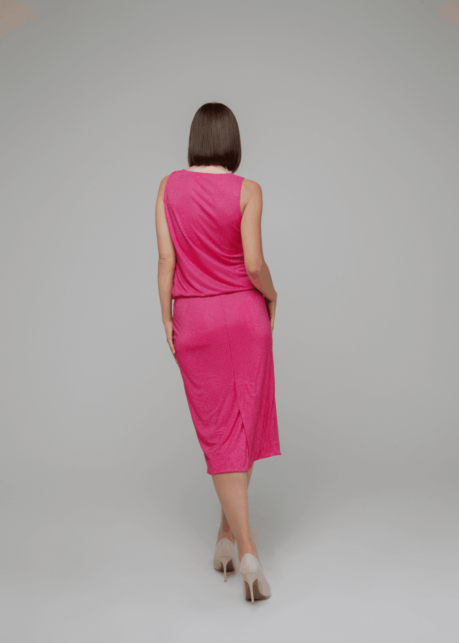 Exquisite detail of Crystal Pencil Skirt showcasing the fine craftsmanship and elegant design characteristic of Axinia Collection 's luxury collection.