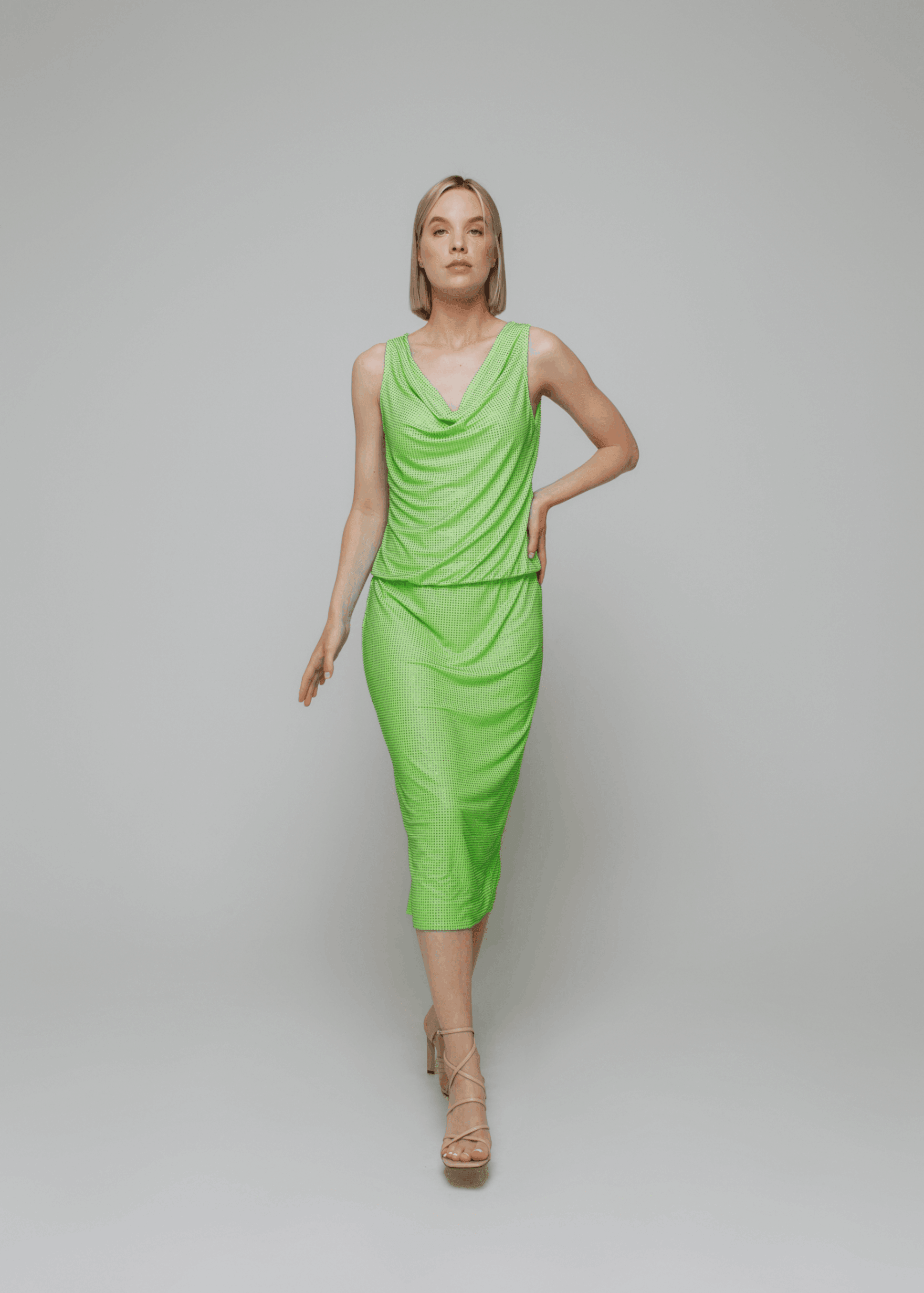 Exquisite detail of Crystal Pencil Skirt showcasing the fine craftsmanship and elegant design characteristic of Axinia Collection 's luxury collection.