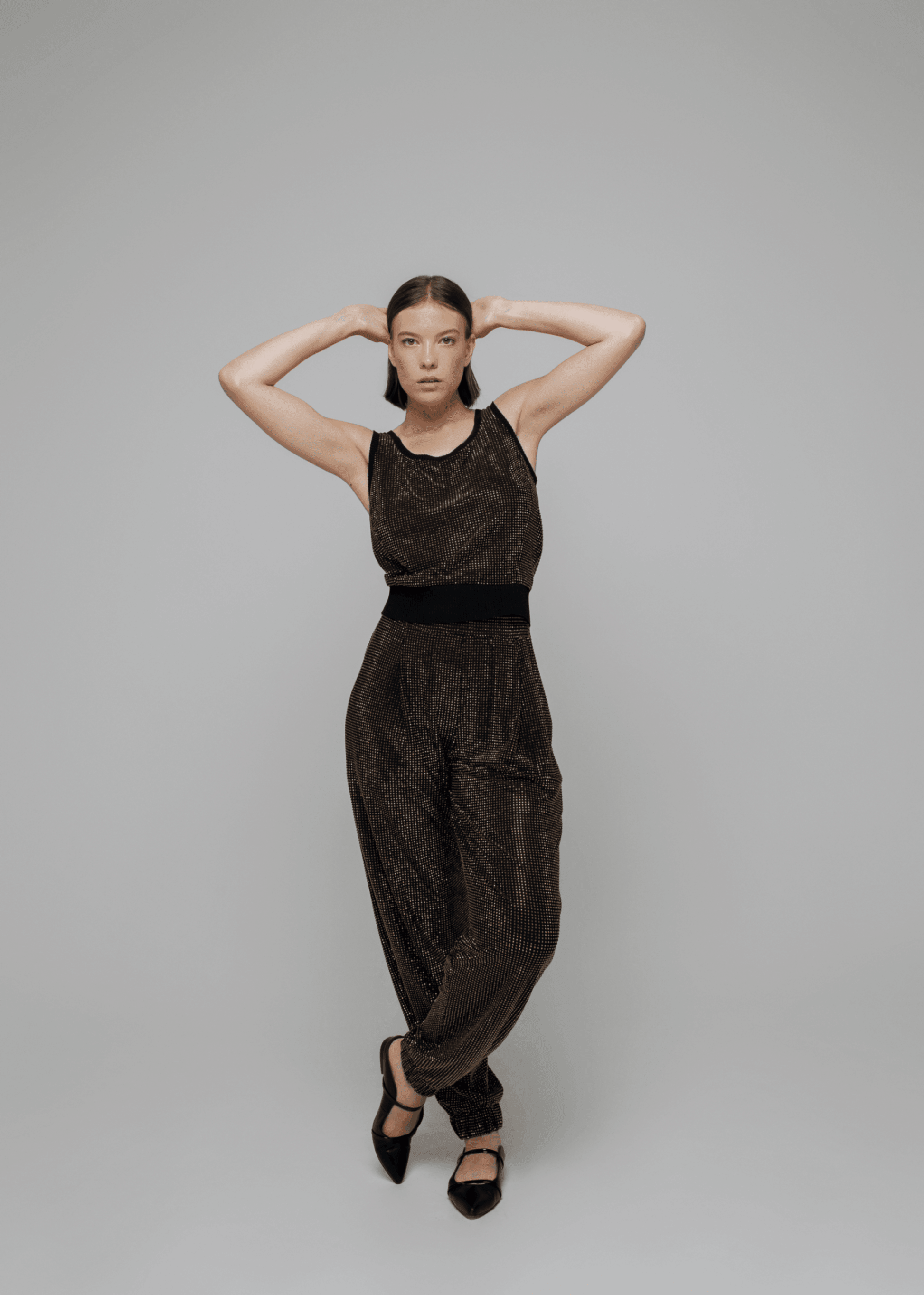 Exquisite detail of Crystal Harem Pants showcasing the fine craftsmanship and elegant design characteristic of Axinia Collection 's luxury collection.