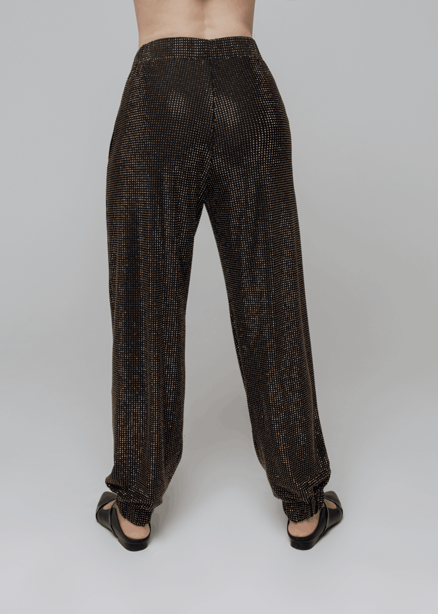 Exquisite detail of Crystal Harem Pants showcasing the fine craftsmanship and elegant design characteristic of Axinia Collection 's luxury collection.