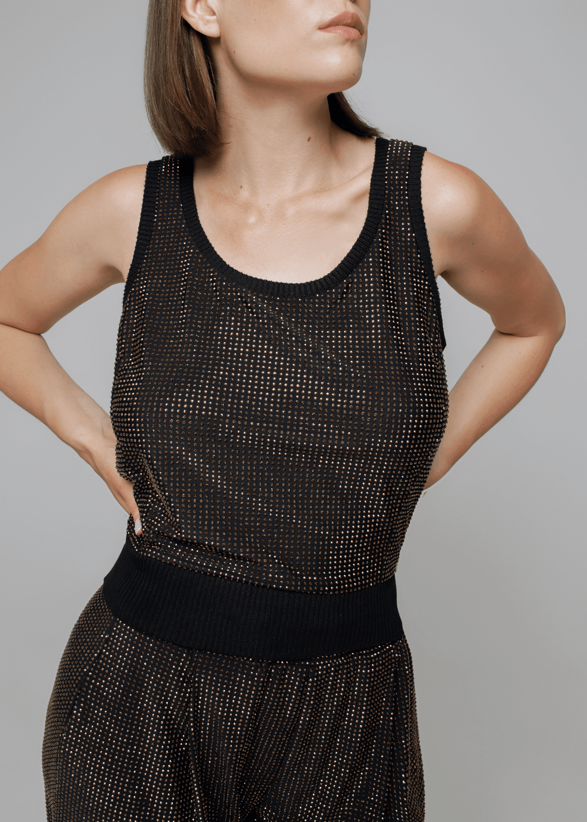 Exquisite detail of Crystal Tank Top showcasing the fine craftsmanship and elegant design characteristic of Axinia Collection 's luxury collection.