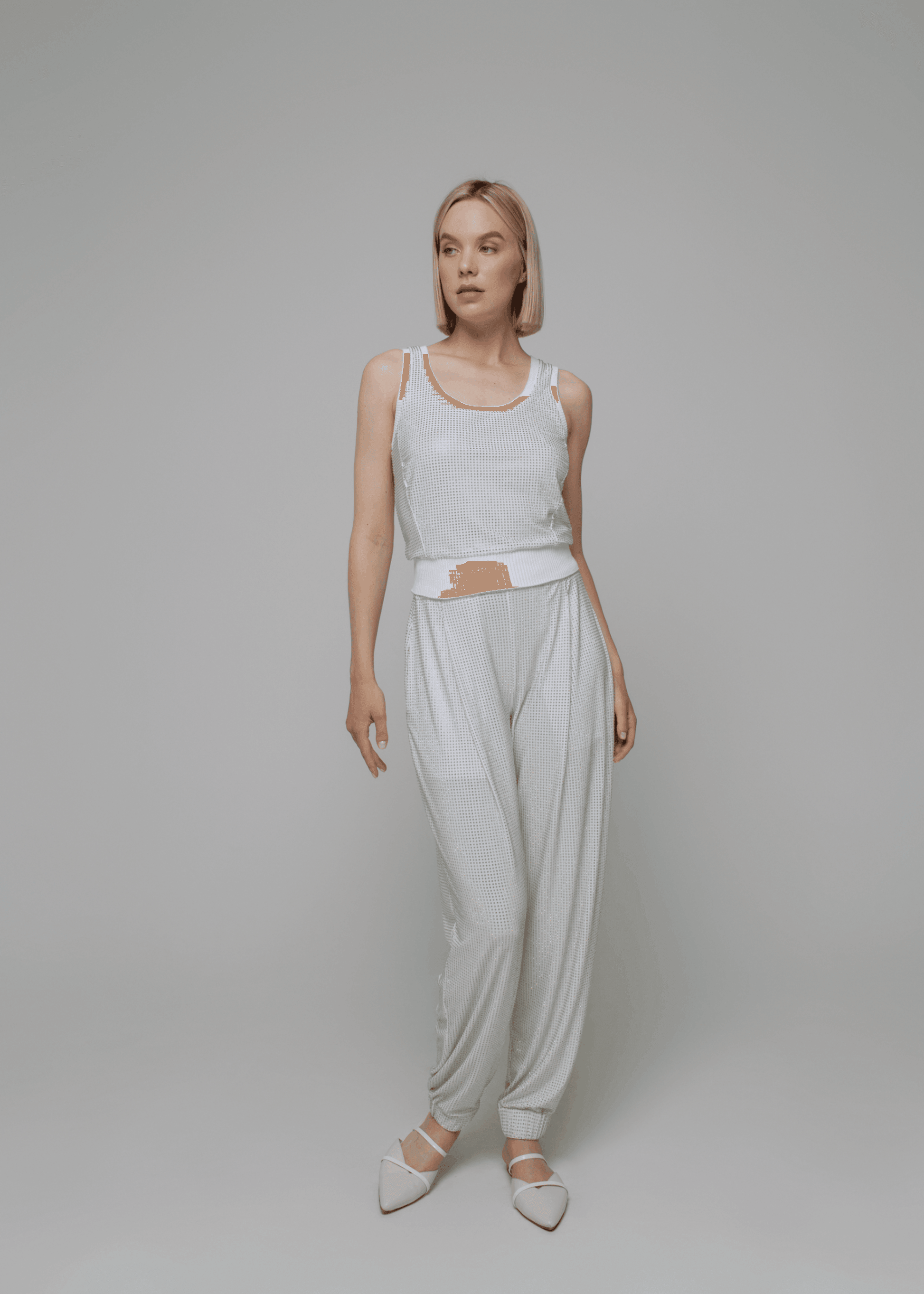 Exquisite detail of Crystal Harem Pants showcasing the fine craftsmanship and elegant design characteristic of Axinia Collection 's luxury collection.