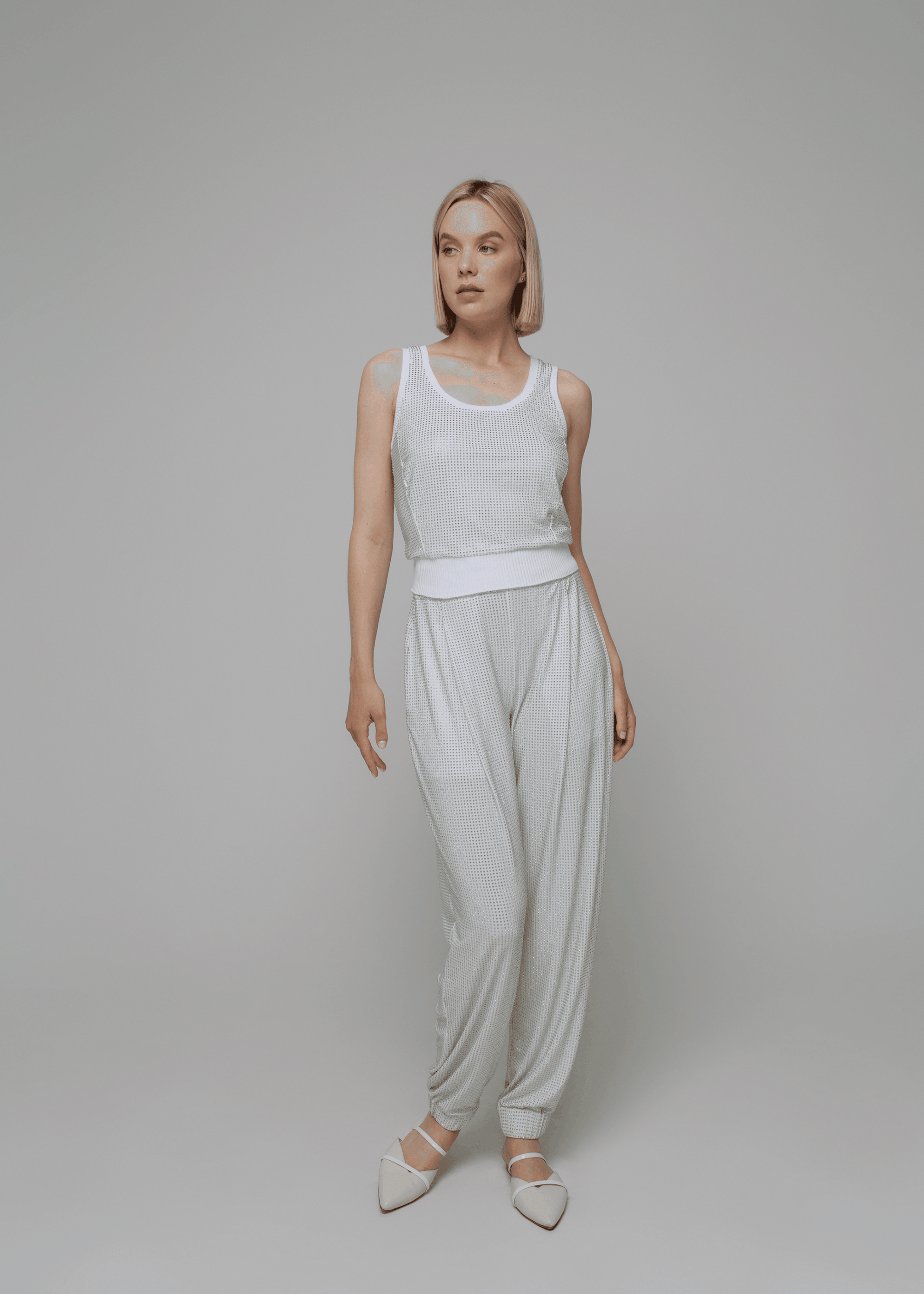 Exquisite detail of Crystal Tank Top showcasing the fine craftsmanship and elegant design characteristic of Axinia Collection 's luxury collection.