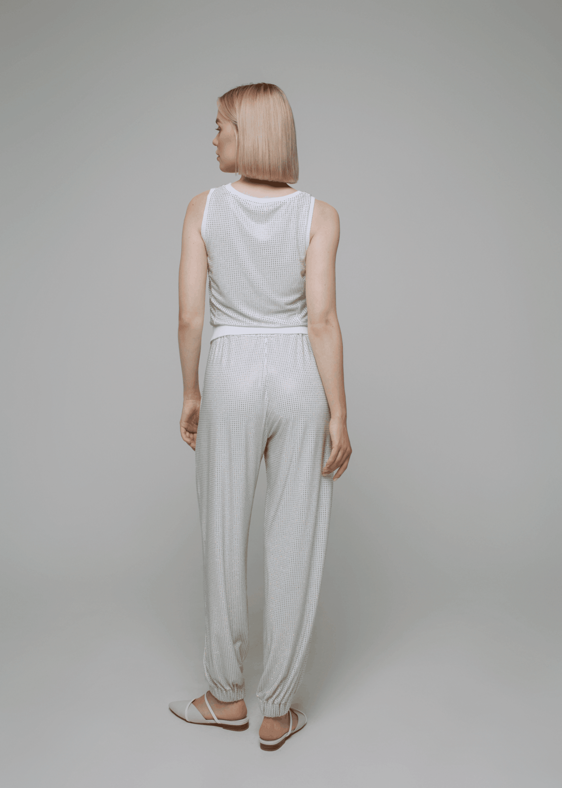 Exquisite detail of Crystal Harem Pants showcasing the fine craftsmanship and elegant design characteristic of Axinia Collection 's luxury collection.