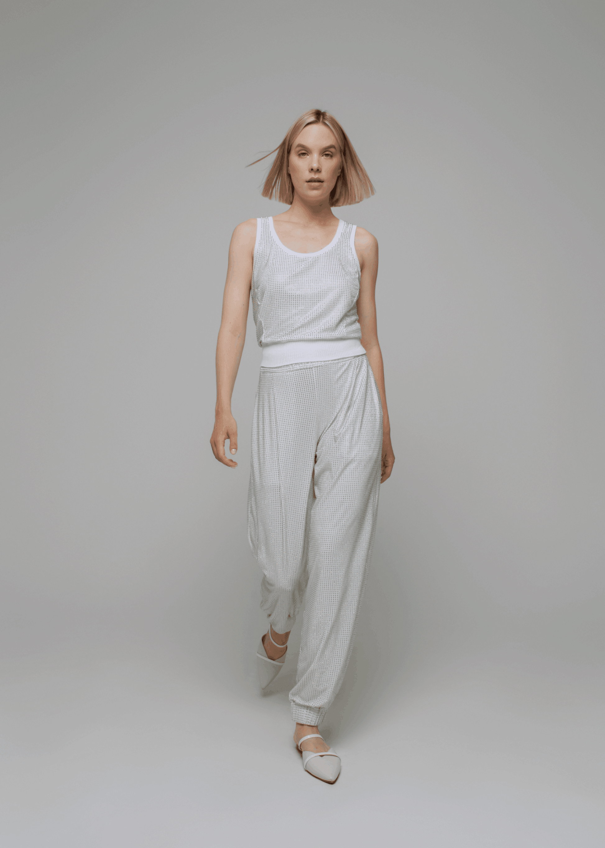 Exquisite detail of Crystal Harem Pants showcasing the fine craftsmanship and elegant design characteristic of Axinia Collection 's luxury collection.