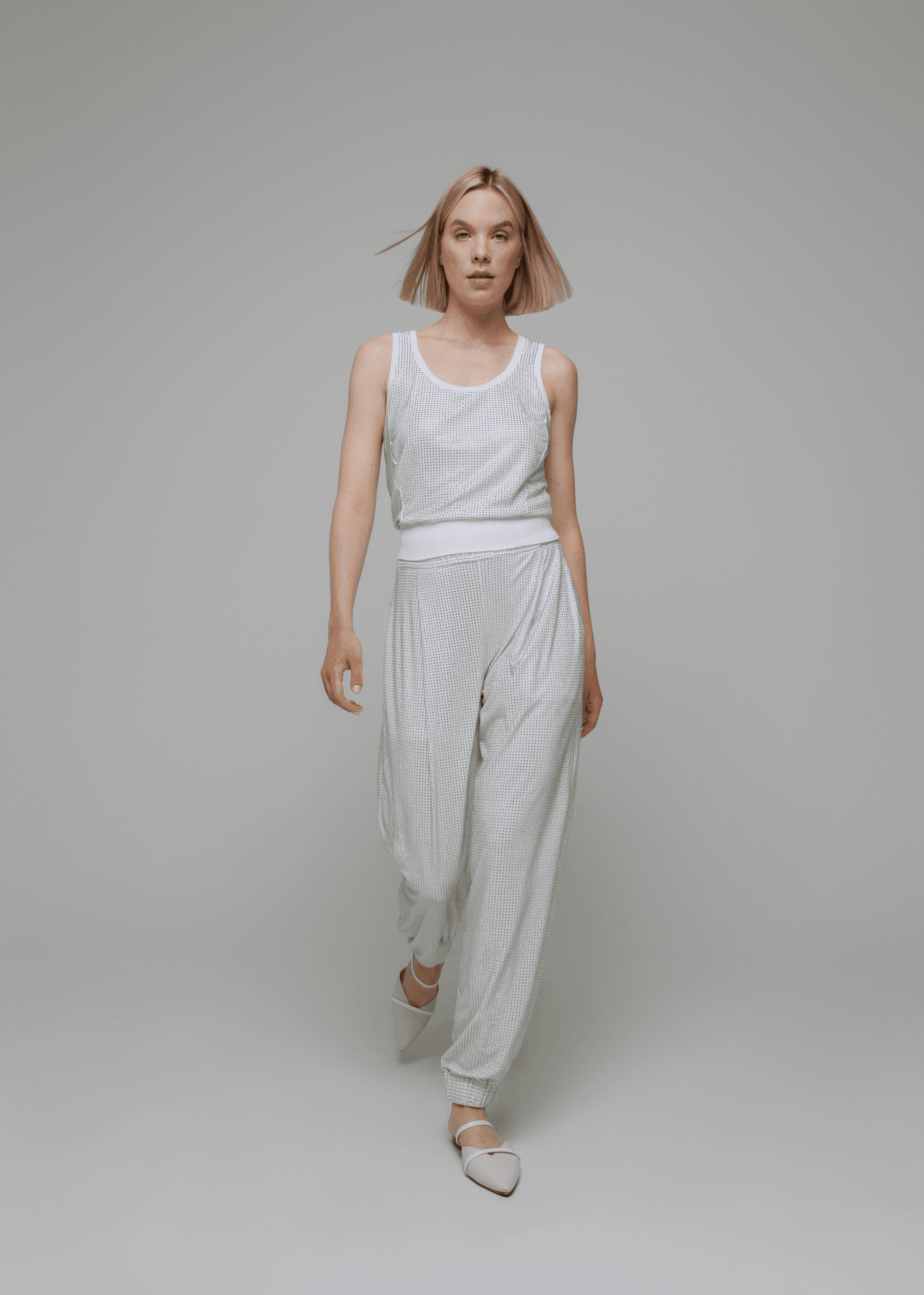 Exquisite detail of Crystal Tank Top showcasing the fine craftsmanship and elegant design characteristic of Axinia Collection 's luxury collection.