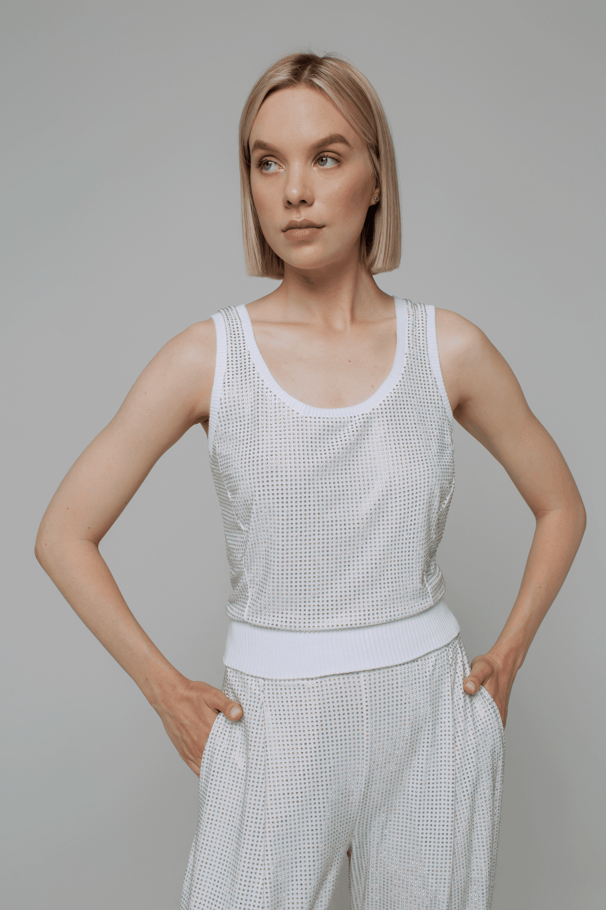 Exquisite detail of Crystal Tank Top showcasing the fine craftsmanship and elegant design characteristic of Axinia Collection 's luxury collection.