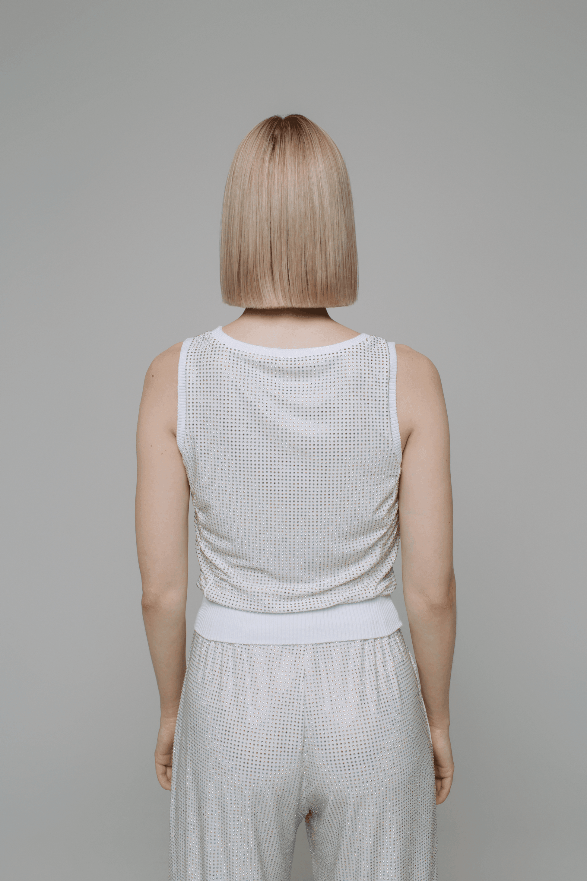 Exquisite detail of Crystal Tank Top showcasing the fine craftsmanship and elegant design characteristic of Axinia Collection 's luxury collection.