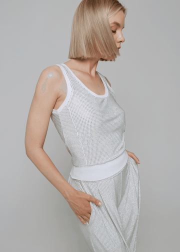 Exquisite detail of Crystal Tank Top showcasing the fine craftsmanship and elegant design characteristic of Axinia Collection 's luxury collection.