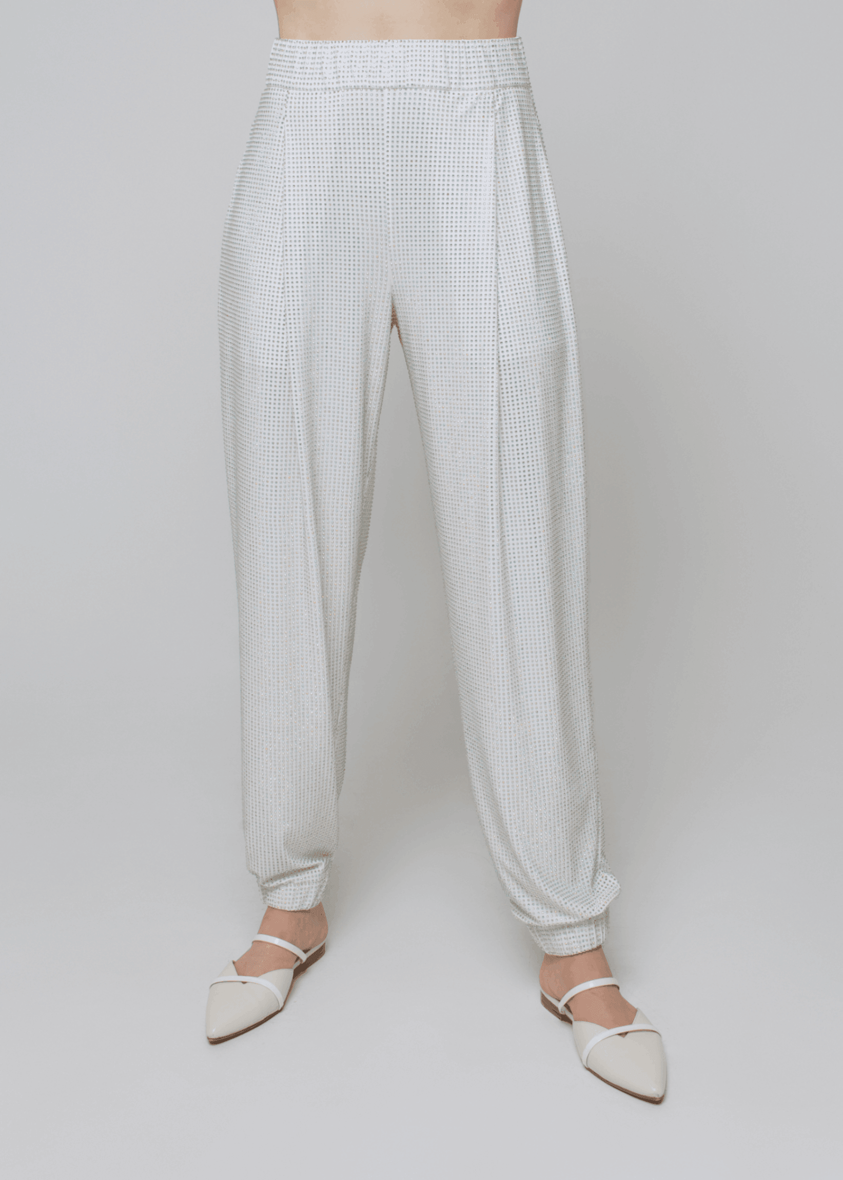 Exquisite detail of Crystal Harem Pants showcasing the fine craftsmanship and elegant design characteristic of Axinia Collection 's luxury collection.