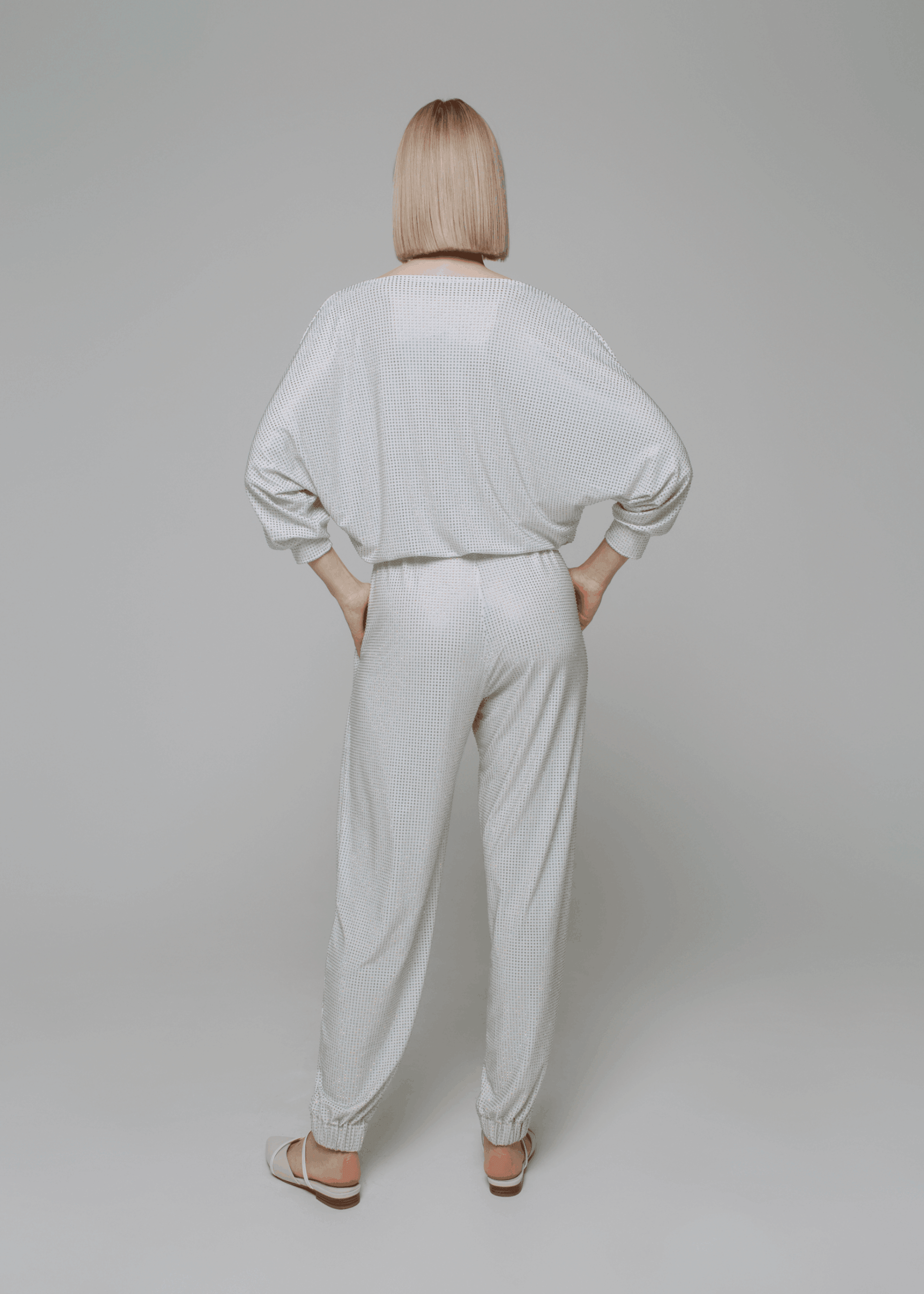 Exquisite detail of Crystal Harem Pants showcasing the fine craftsmanship and elegant design characteristic of Axinia Collection 's luxury collection.