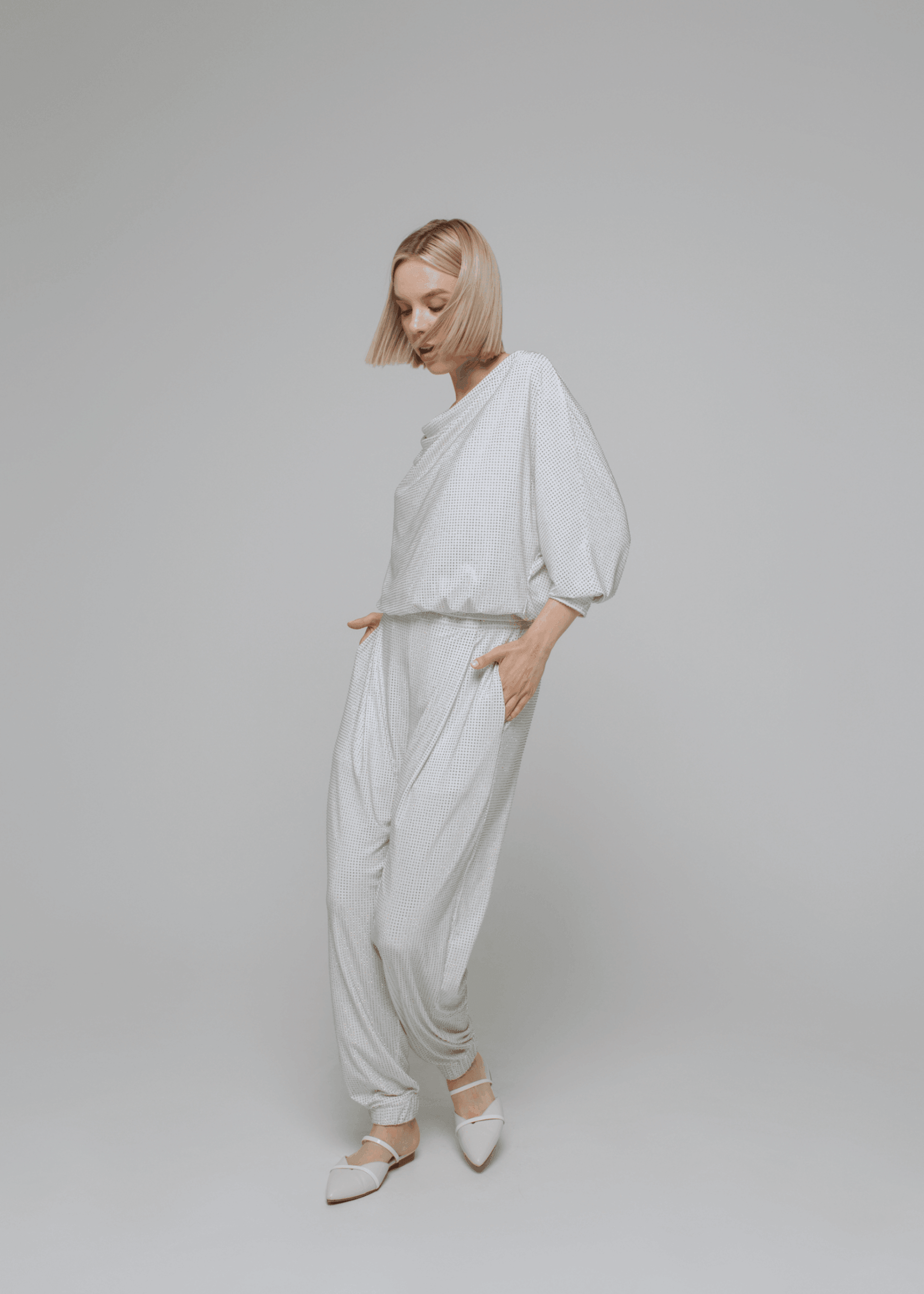 Exquisite detail of Crystal Harem Pants showcasing the fine craftsmanship and elegant design characteristic of Axinia Collection 's luxury collection.