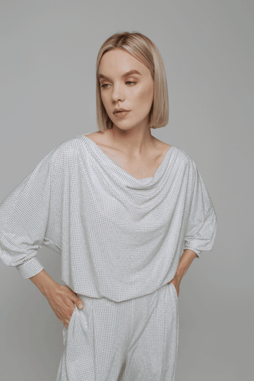 Exquisite detail of Crystal Cowlneck Three Quarter Dolman Sleeves showcasing the fine craftsmanship and elegant design characteristic of Axinia Collection 's luxury collection.