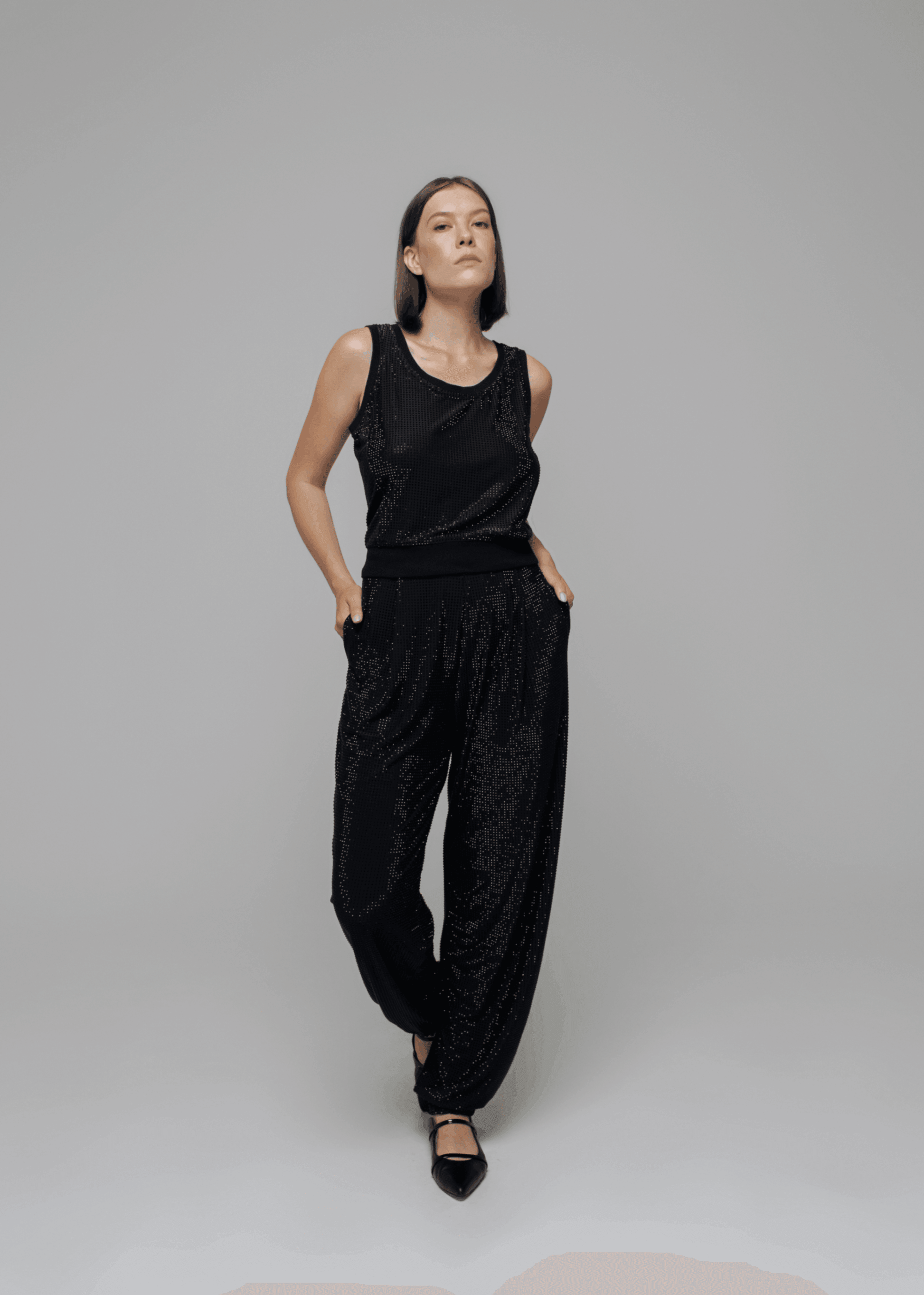 Exquisite detail of Crystal Harem Pants showcasing the fine craftsmanship and elegant design characteristic of Axinia Collection 's luxury collection.