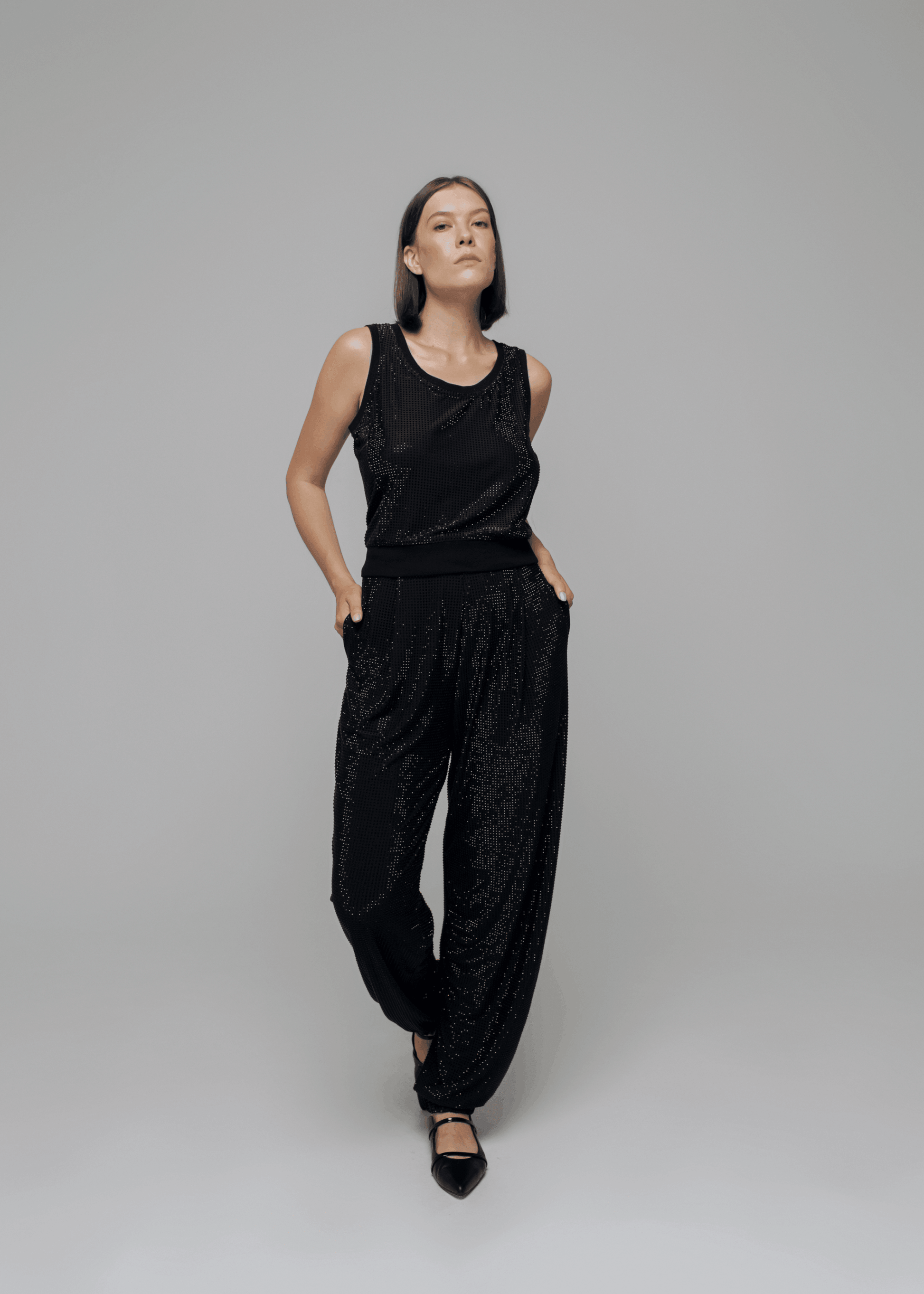 Exquisite detail of Crystal Tank Top showcasing the fine craftsmanship and elegant design characteristic of Axinia Collection 's luxury collection.