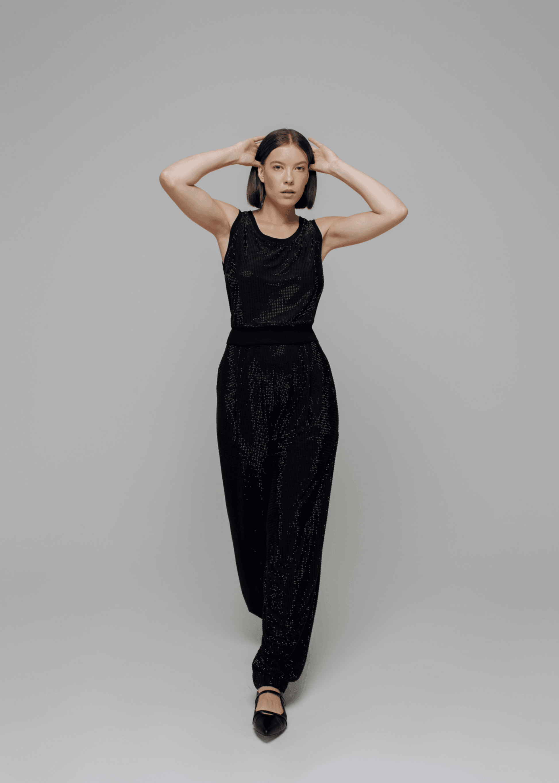 Exquisite detail of Crystal Harem Pants showcasing the fine craftsmanship and elegant design characteristic of Axinia Collection 's luxury collection.