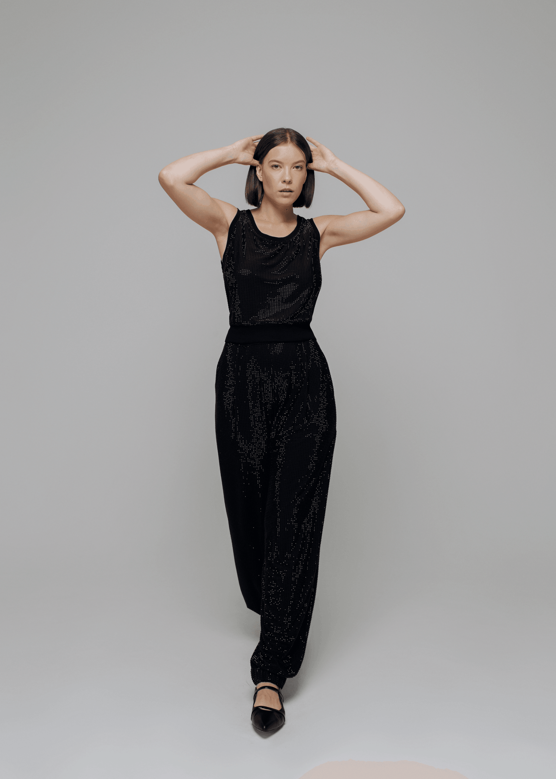 Exquisite detail of Crystal Tank Top showcasing the fine craftsmanship and elegant design characteristic of Axinia Collection 's luxury collection.