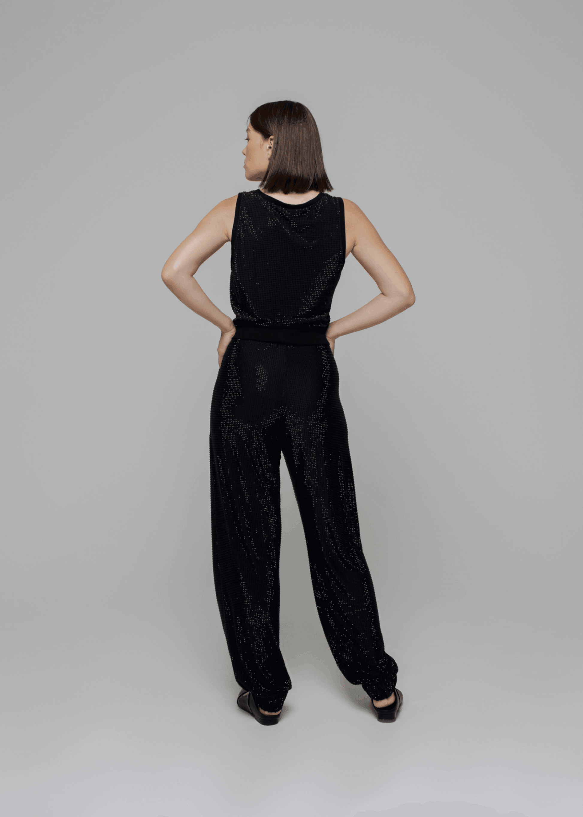 Exquisite detail of Crystal Harem Pants showcasing the fine craftsmanship and elegant design characteristic of Axinia Collection 's luxury collection.