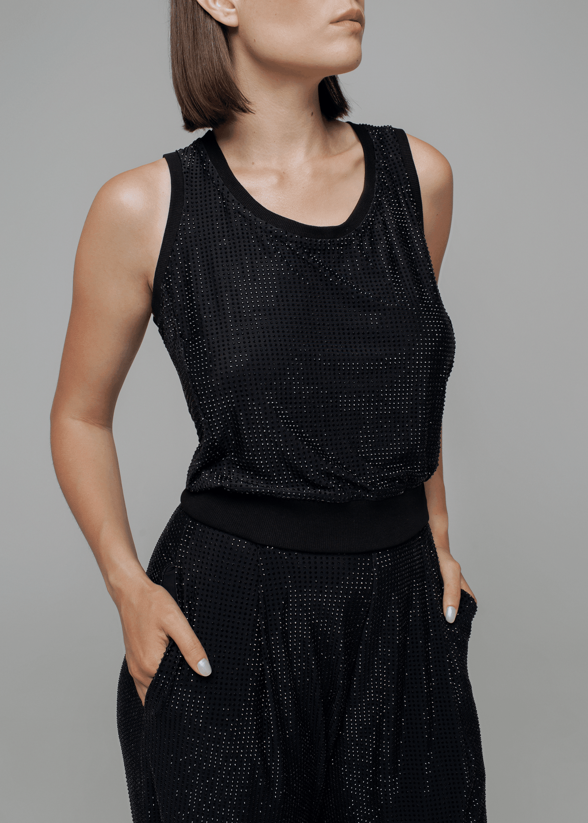 Exquisite detail of Crystal Tank Top showcasing the fine craftsmanship and elegant design characteristic of Axinia Collection 's luxury collection.