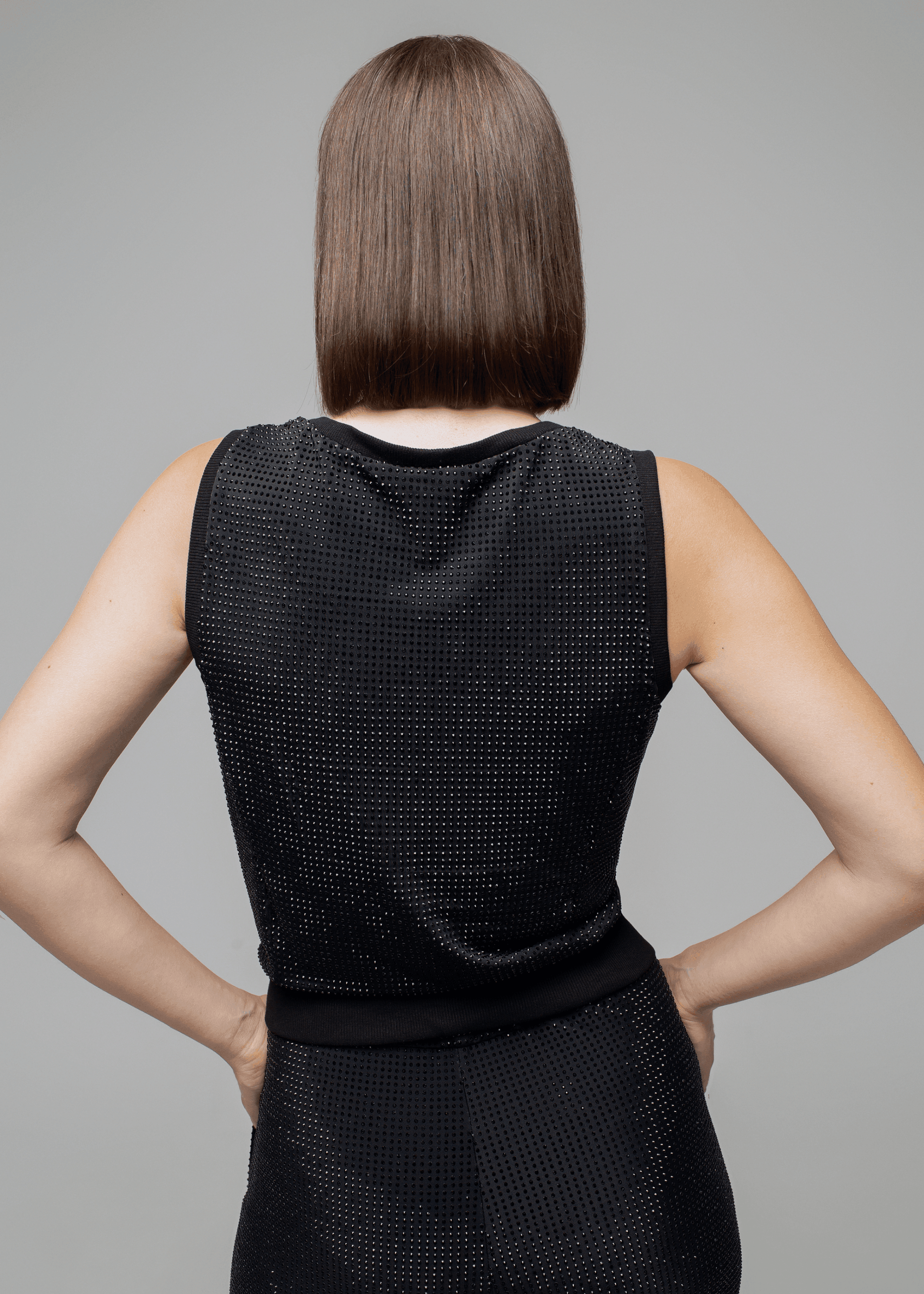 Exquisite detail of Crystal Tank Top showcasing the fine craftsmanship and elegant design characteristic of Axinia Collection 's luxury collection.