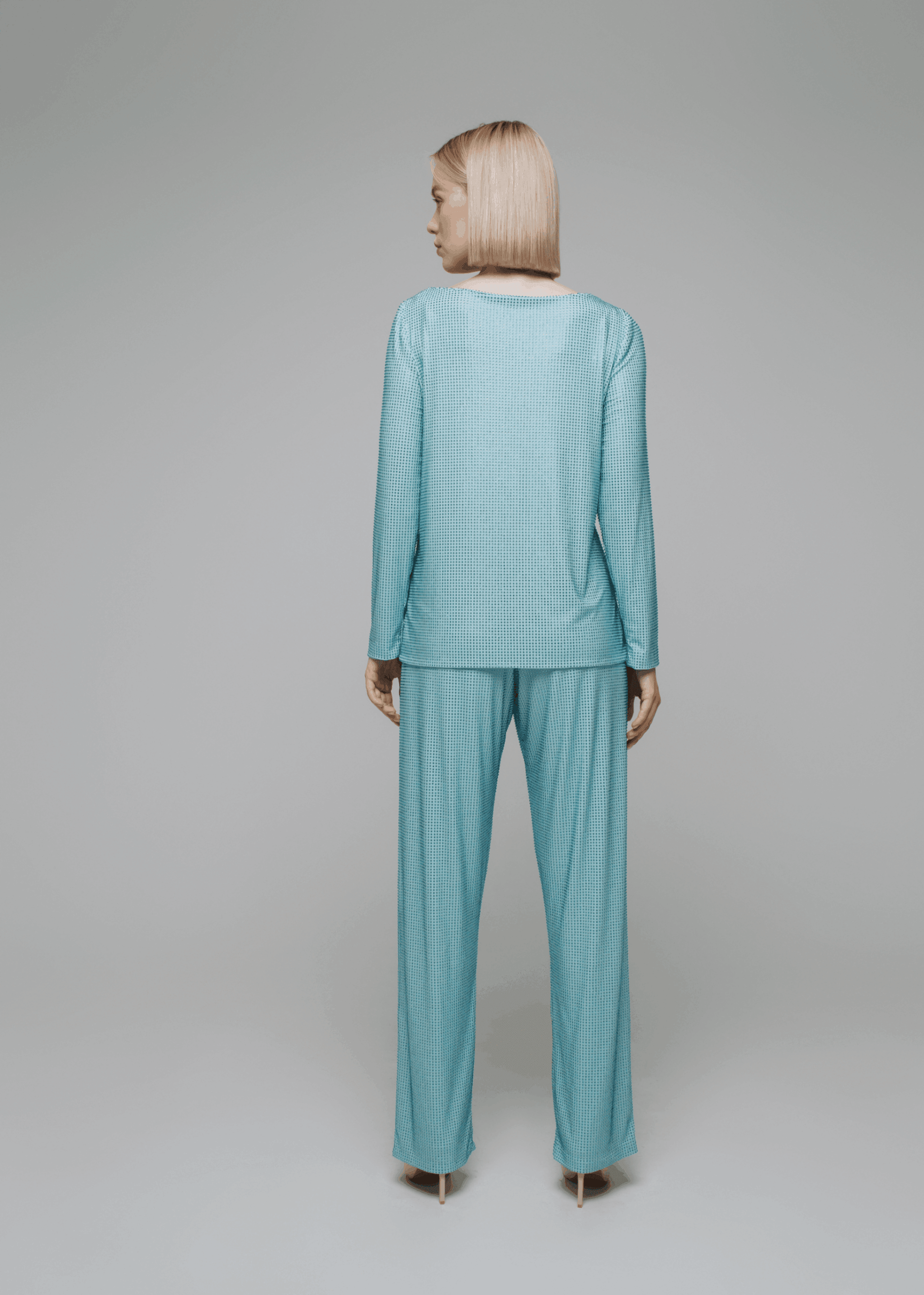 Exquisite detail of Crystal Trousers showcasing the fine craftsmanship and elegant design characteristic of Axinia Collection 's luxury collection.