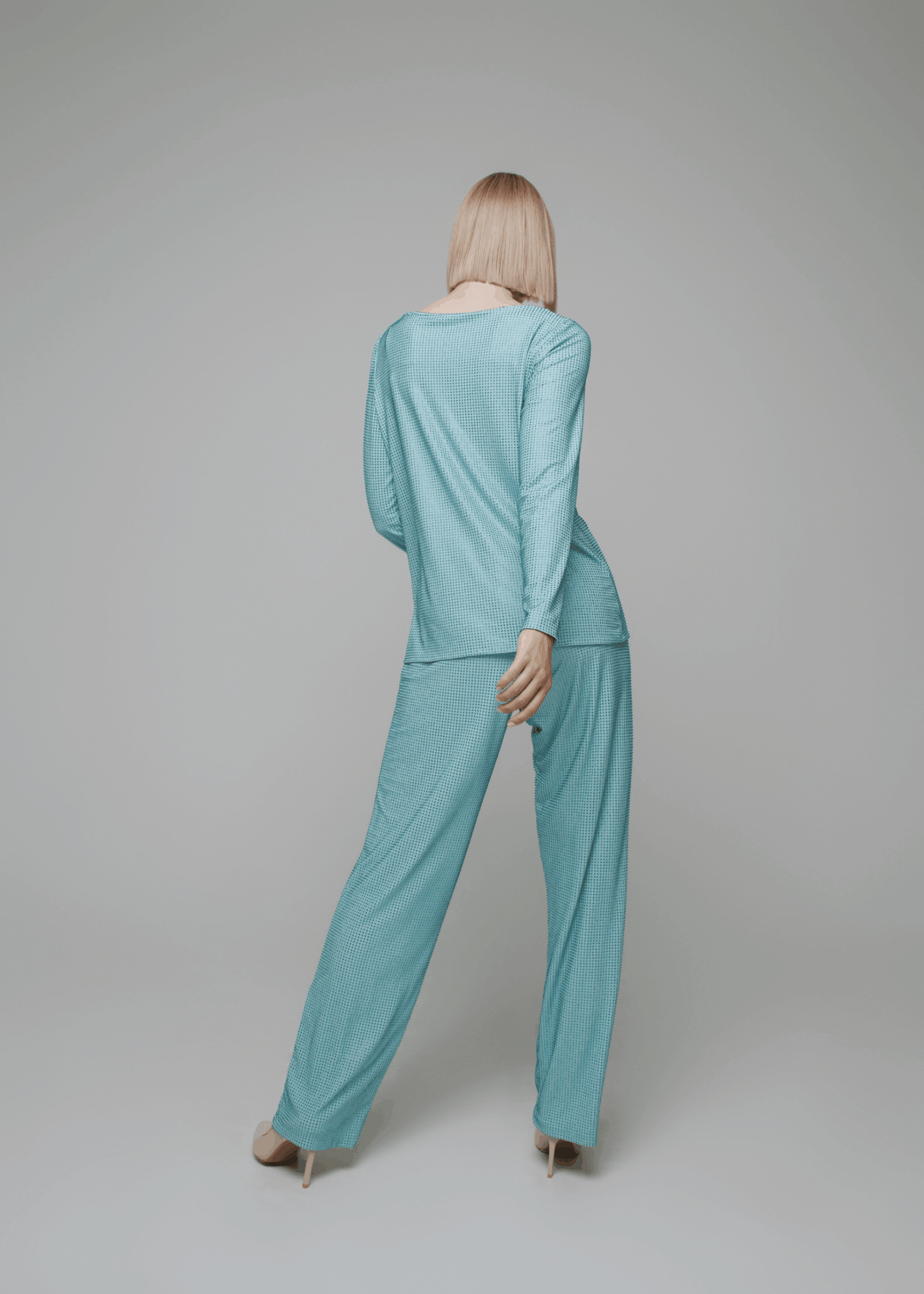 Exquisite detail of Crystal Long Sleeve Tunica Top showcasing the fine craftsmanship and elegant design characteristic of Axinia Collection 's luxury collection.