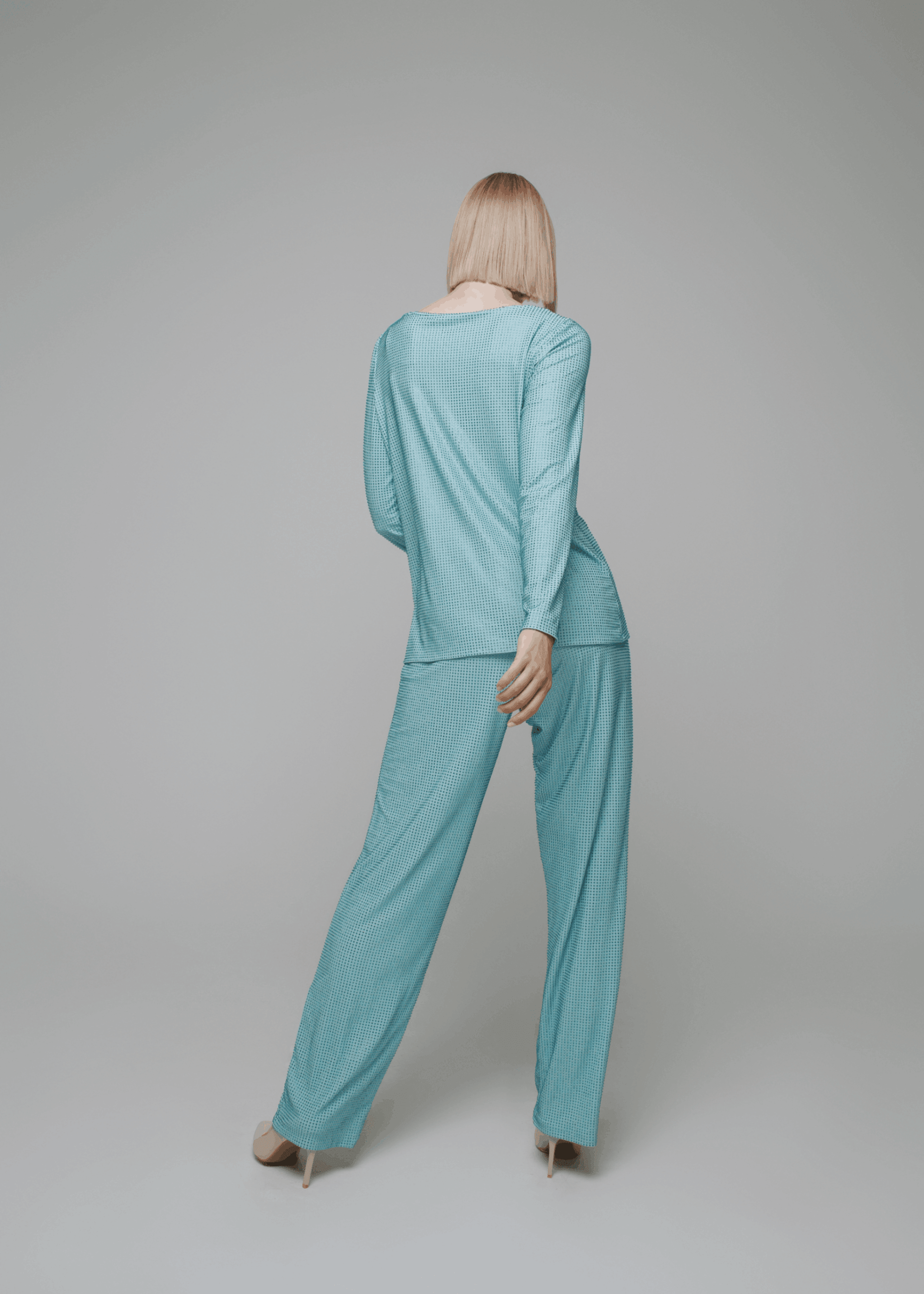 Exquisite detail of Crystal Trousers showcasing the fine craftsmanship and elegant design characteristic of Axinia Collection 's luxury collection.