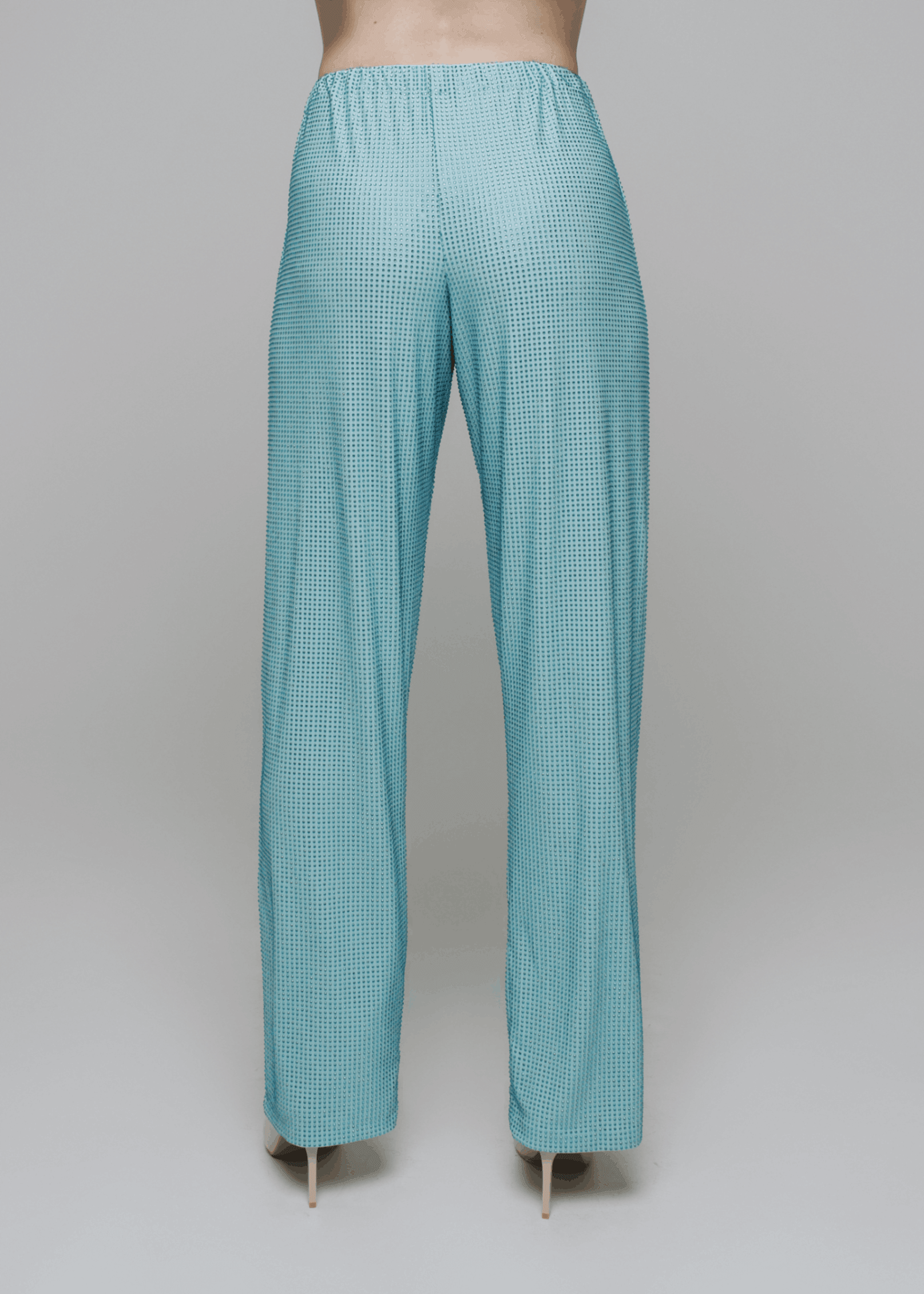 Exquisite detail of Crystal Trousers showcasing the fine craftsmanship and elegant design characteristic of Axinia Collection 's luxury collection.