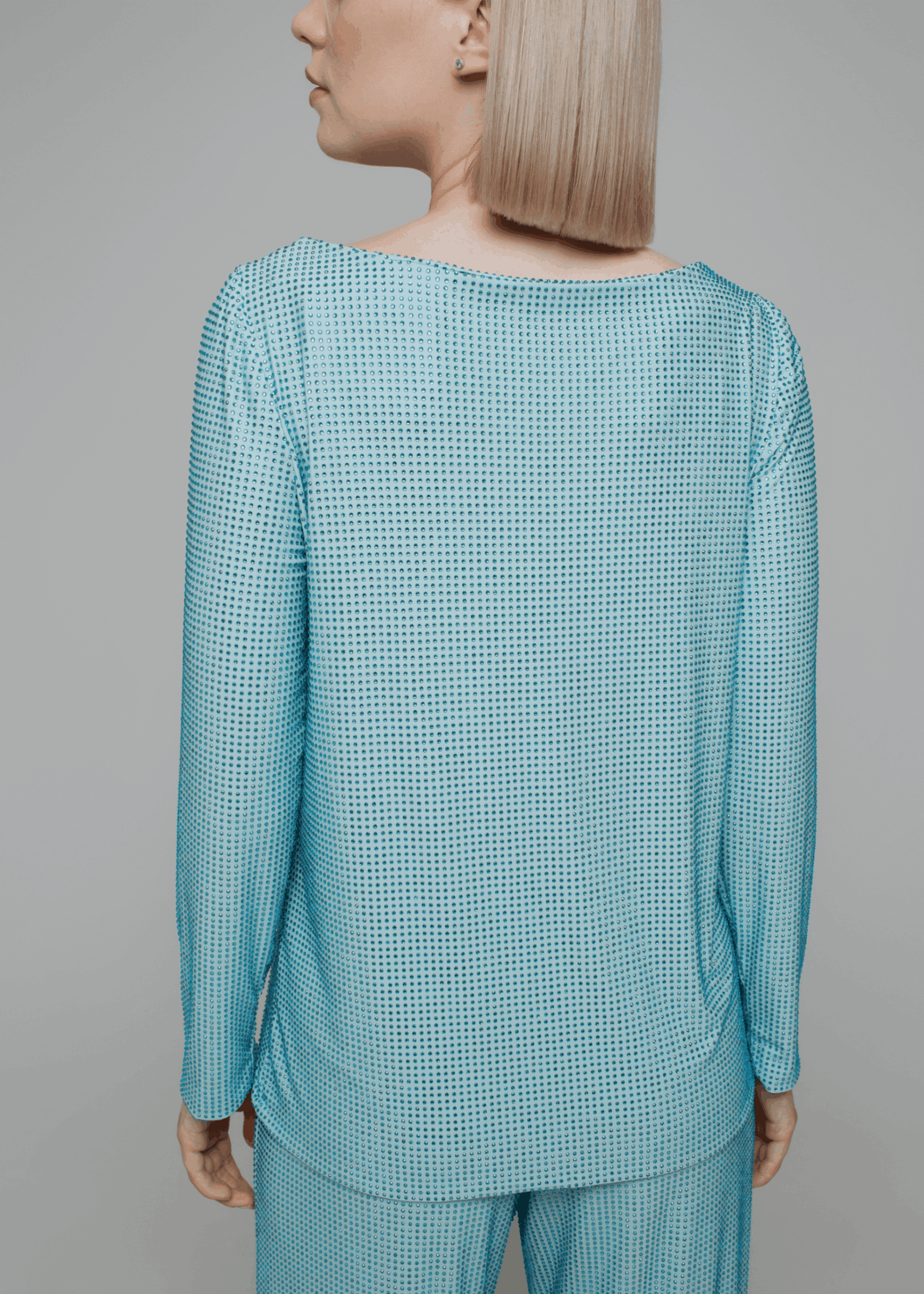 Exquisite detail of Crystal Long Sleeve Tunica Top showcasing the fine craftsmanship and elegant design characteristic of Axinia Collection 's luxury collection.