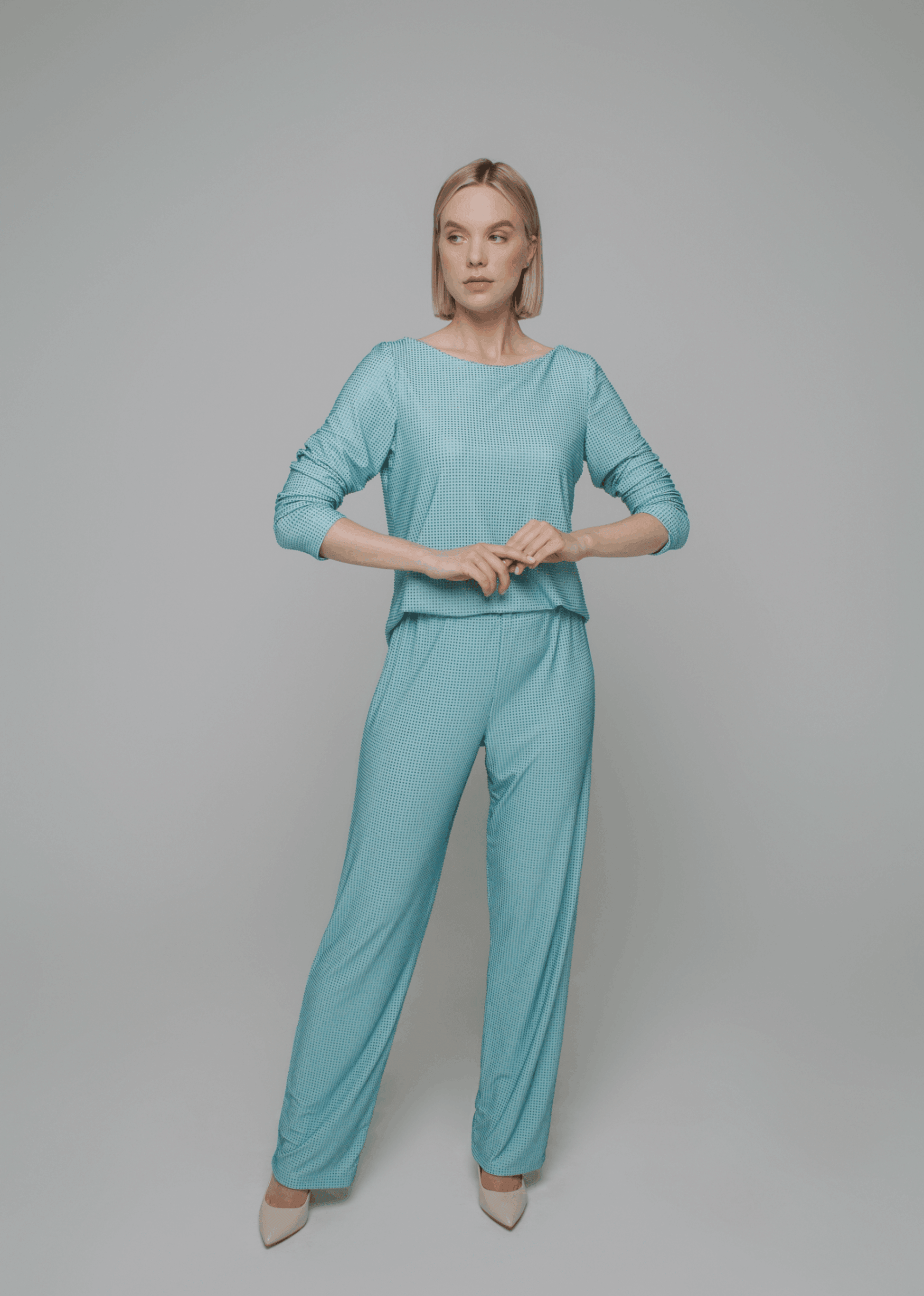 Exquisite detail of Crystal Trousers showcasing the fine craftsmanship and elegant design characteristic of Axinia Collection 's luxury collection.