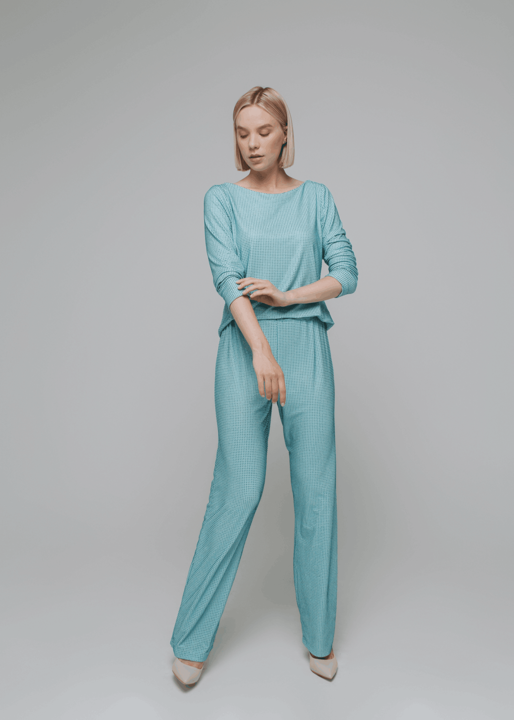 Exquisite detail of Crystal Trousers showcasing the fine craftsmanship and elegant design characteristic of Axinia Collection 's luxury collection.