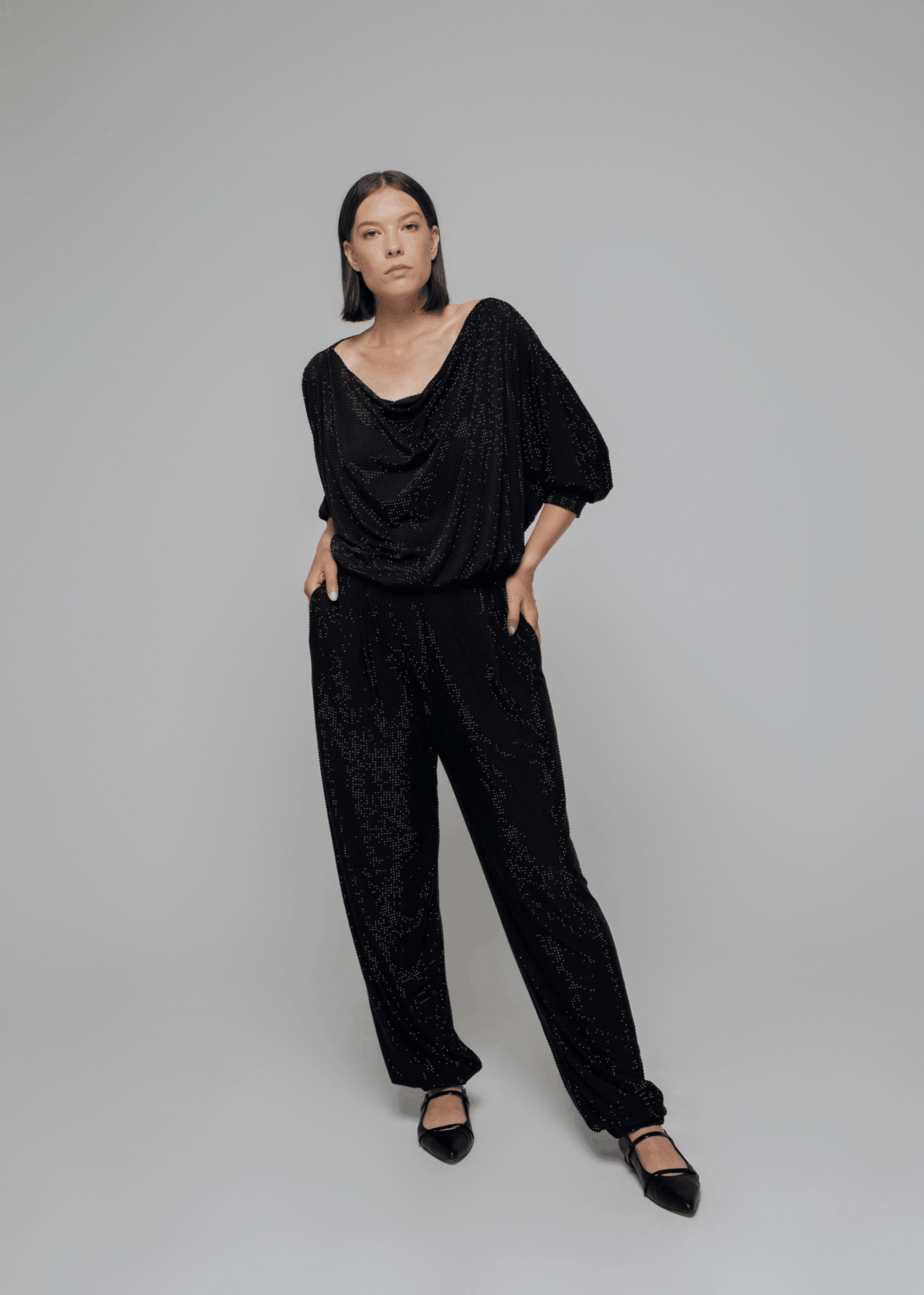 Exquisite detail of Crystal Harem Pants showcasing the fine craftsmanship and elegant design characteristic of Axinia Collection 's luxury collection.