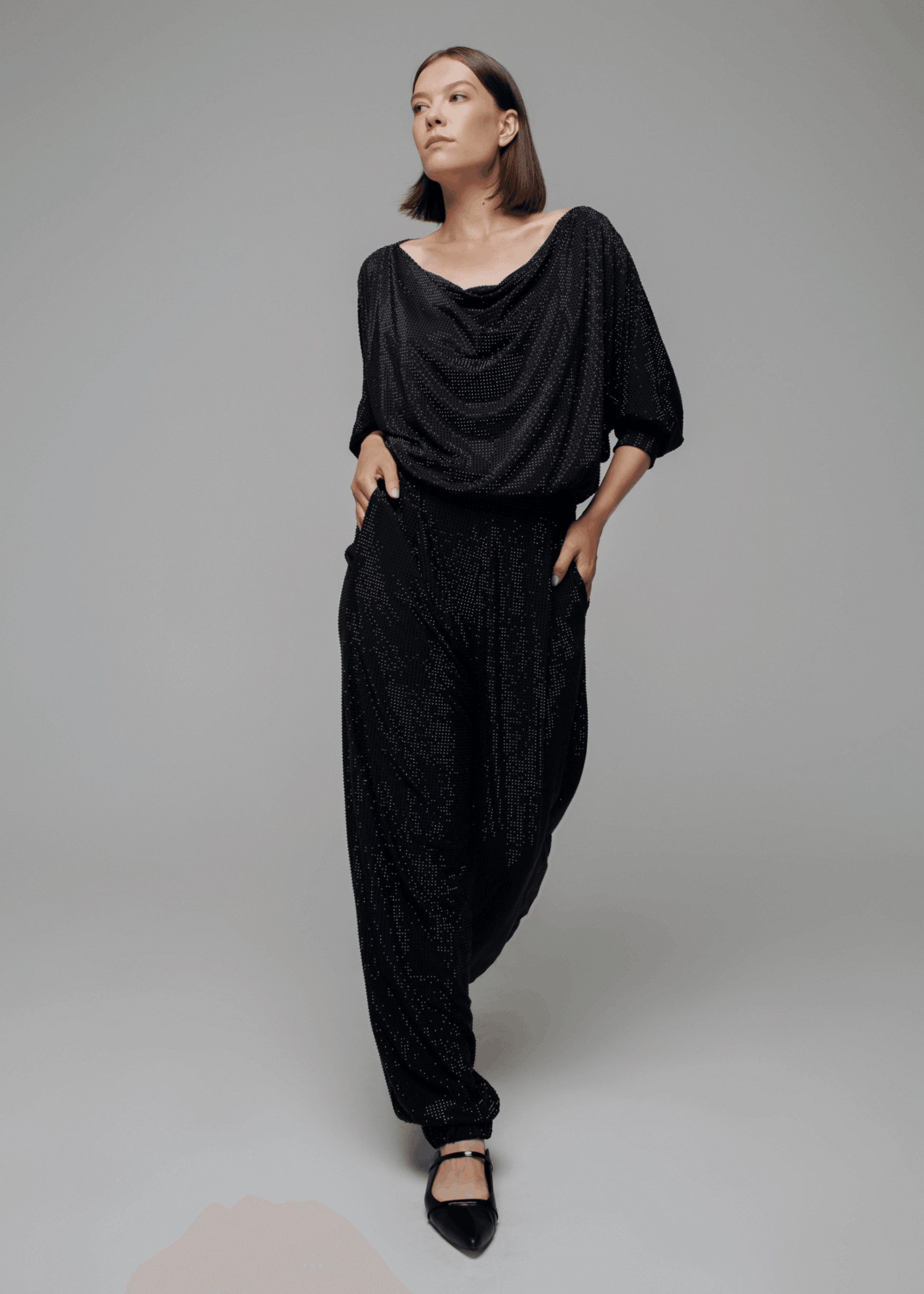 Exquisite detail of Crystal Harem Pants showcasing the fine craftsmanship and elegant design characteristic of Axinia Collection 's luxury collection.