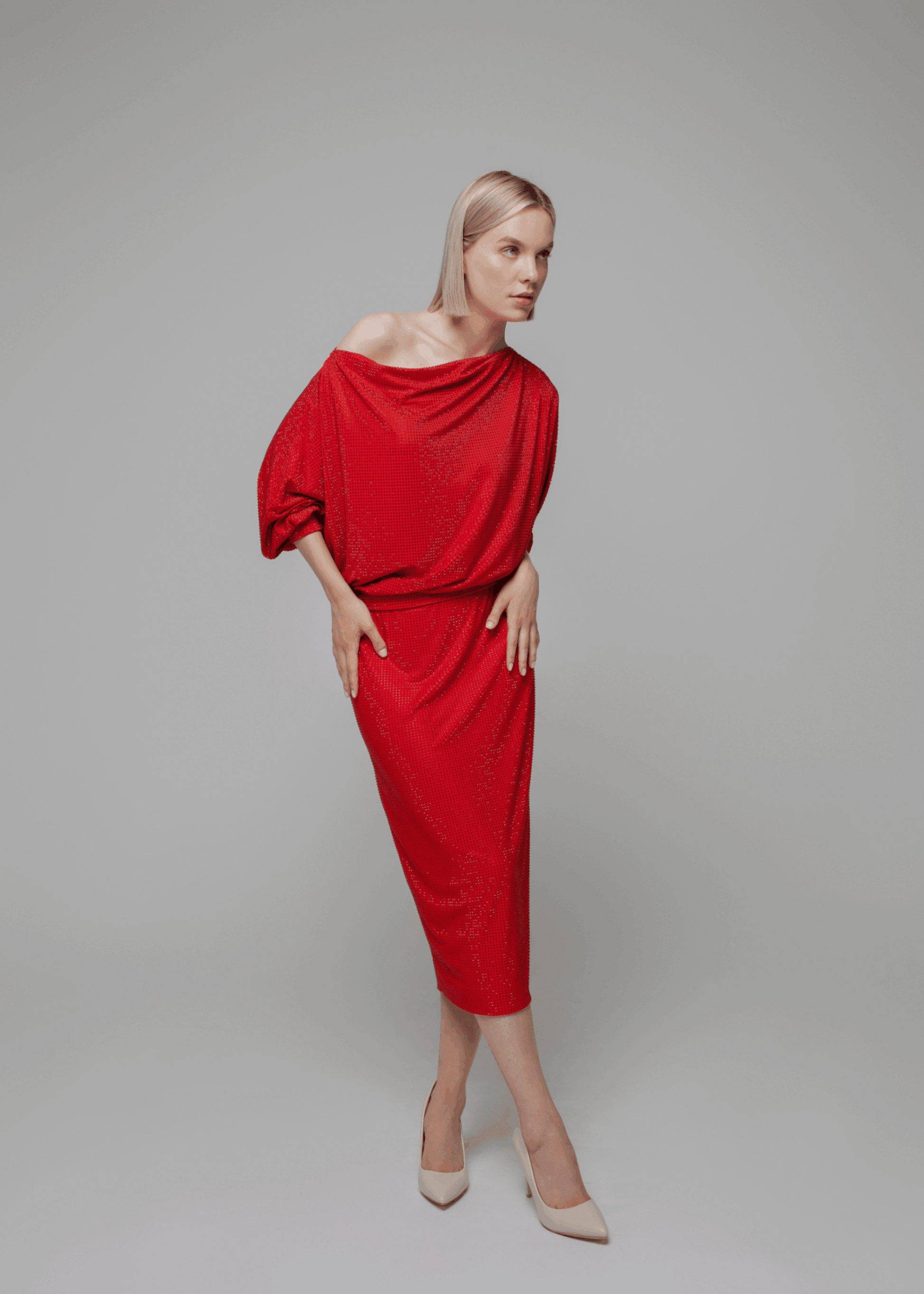 Exquisite detail of Crystal Pencil Skirt showcasing the fine craftsmanship and elegant design characteristic of Axinia Collection 's luxury collection.