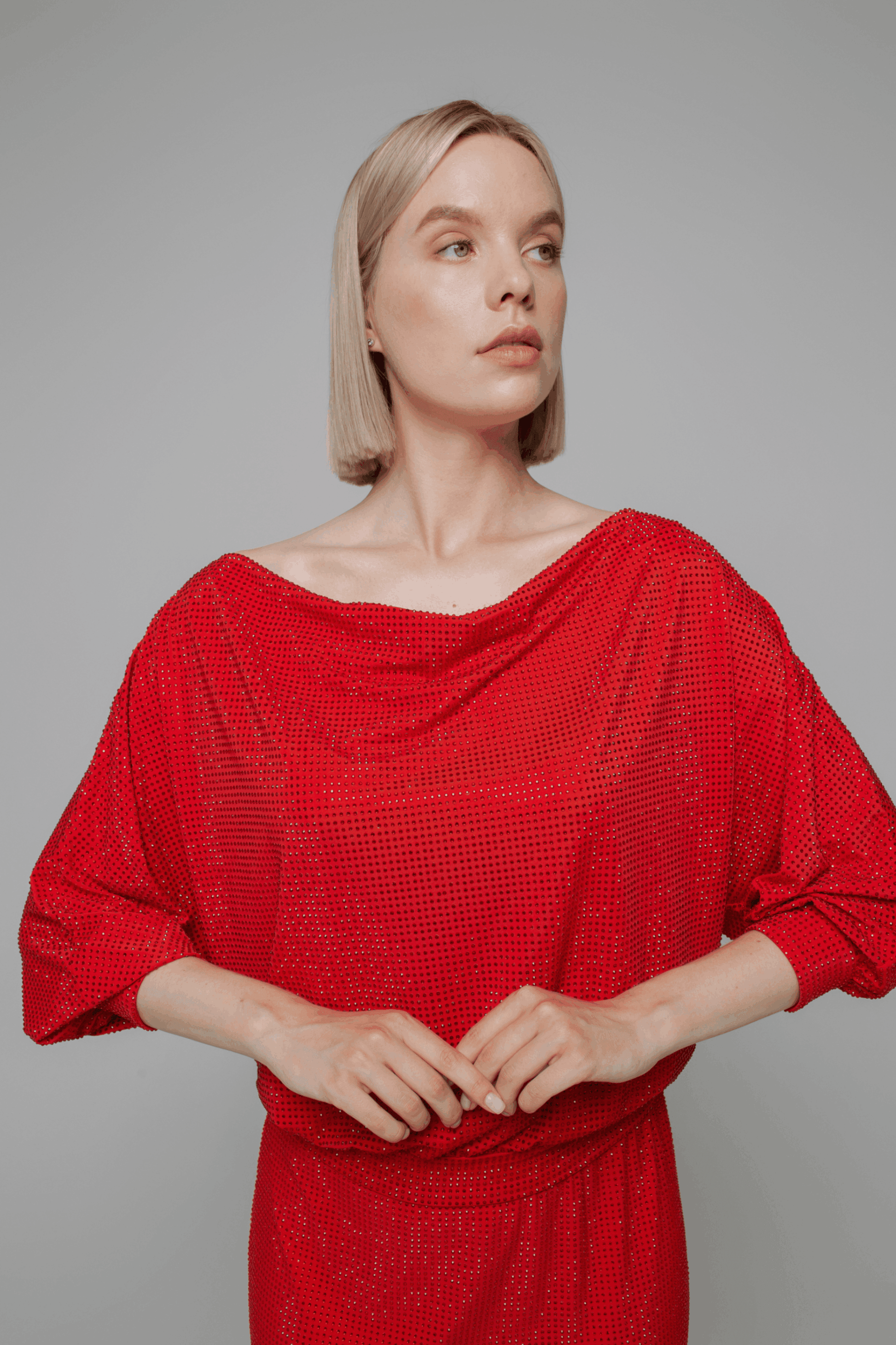 Exquisite detail of Crystal Cowlneck Three Quarter Dolman Sleeves showcasing the fine craftsmanship and elegant design characteristic of Axinia Collection 's luxury collection.