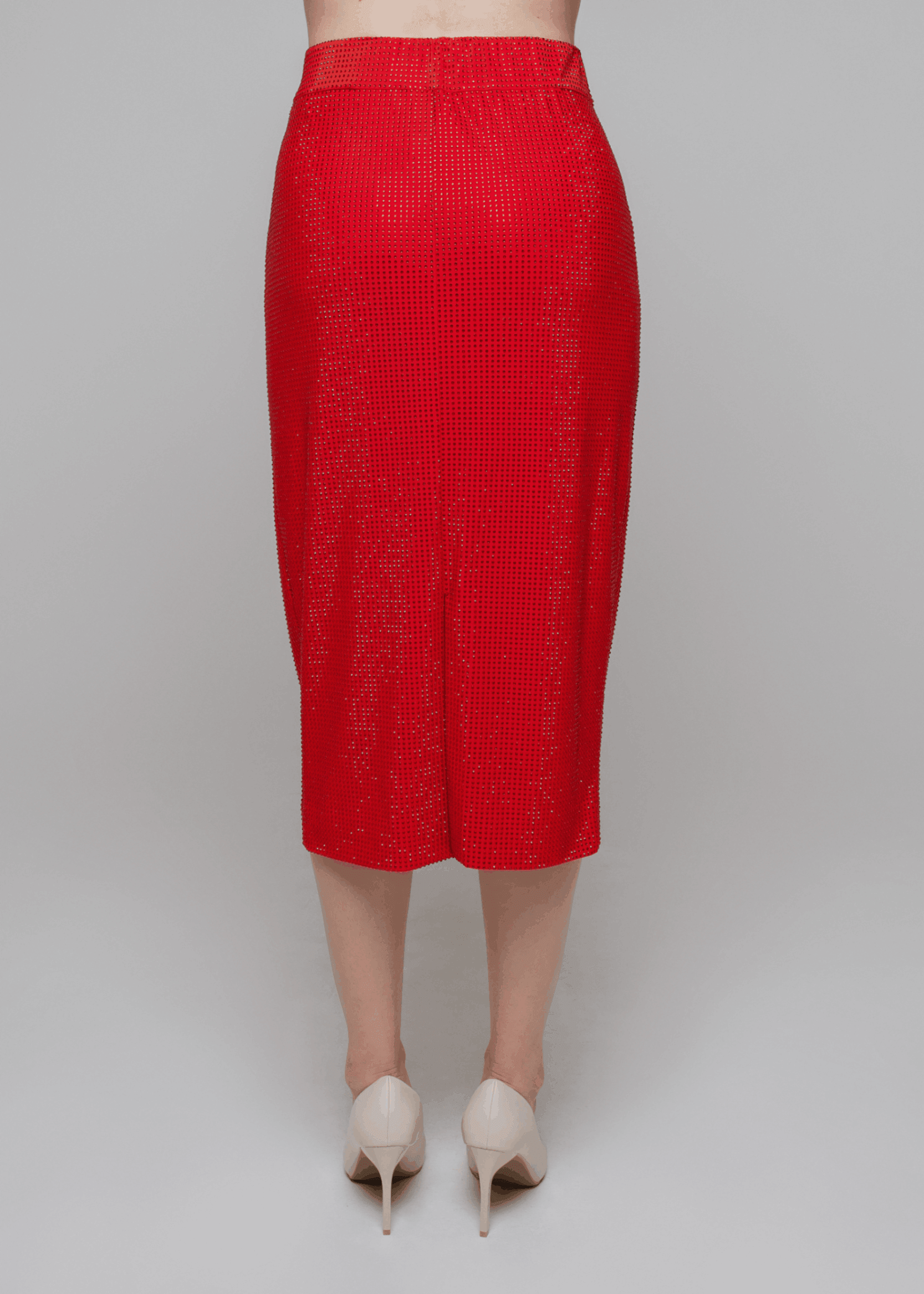 Exquisite detail of Crystal Pencil Skirt showcasing the fine craftsmanship and elegant design characteristic of Axinia Collection 's luxury collection.