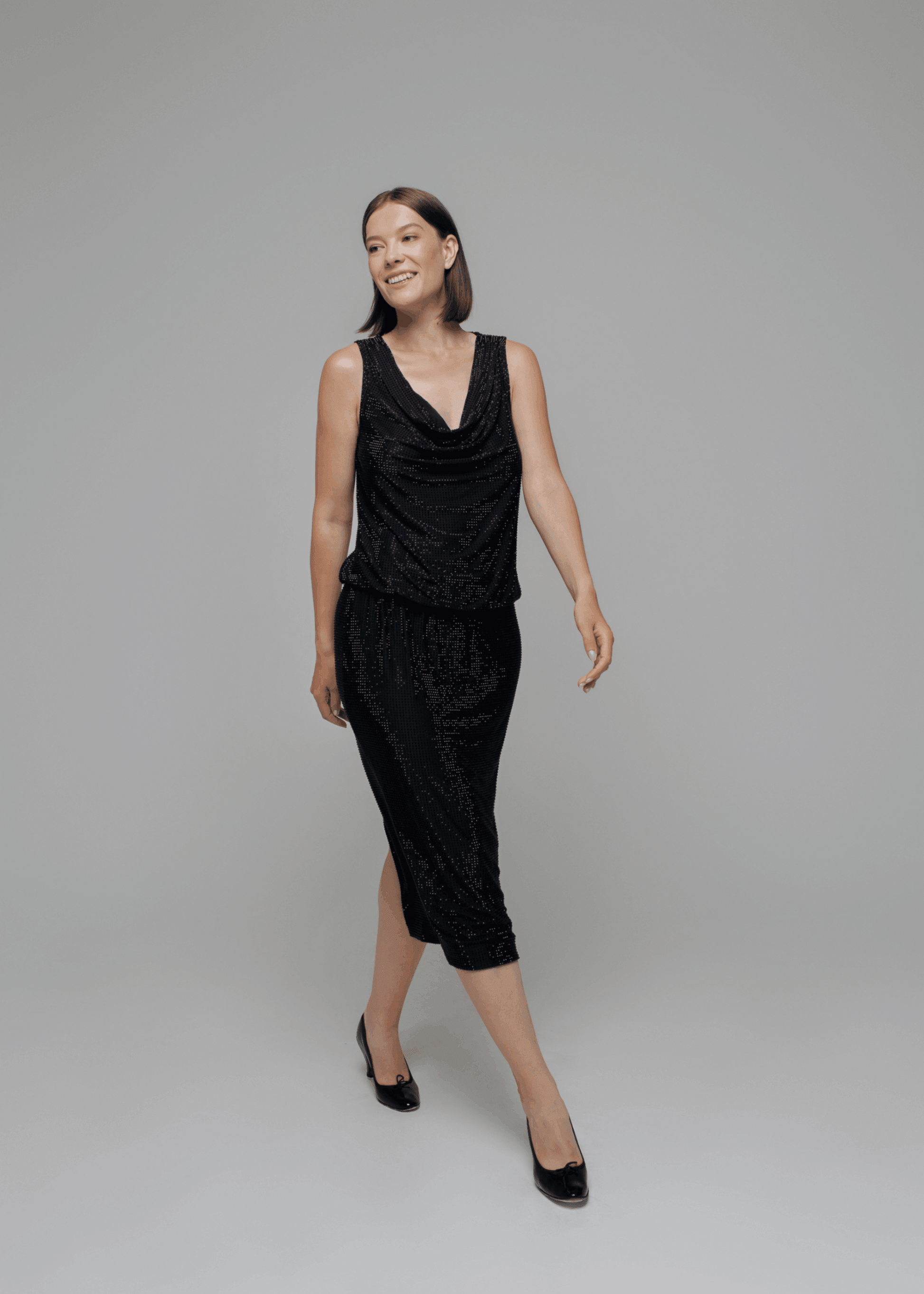 Exquisite detail of Crystal Pencil Skirt showcasing the fine craftsmanship and elegant design characteristic of Axinia Collection 's luxury collection.