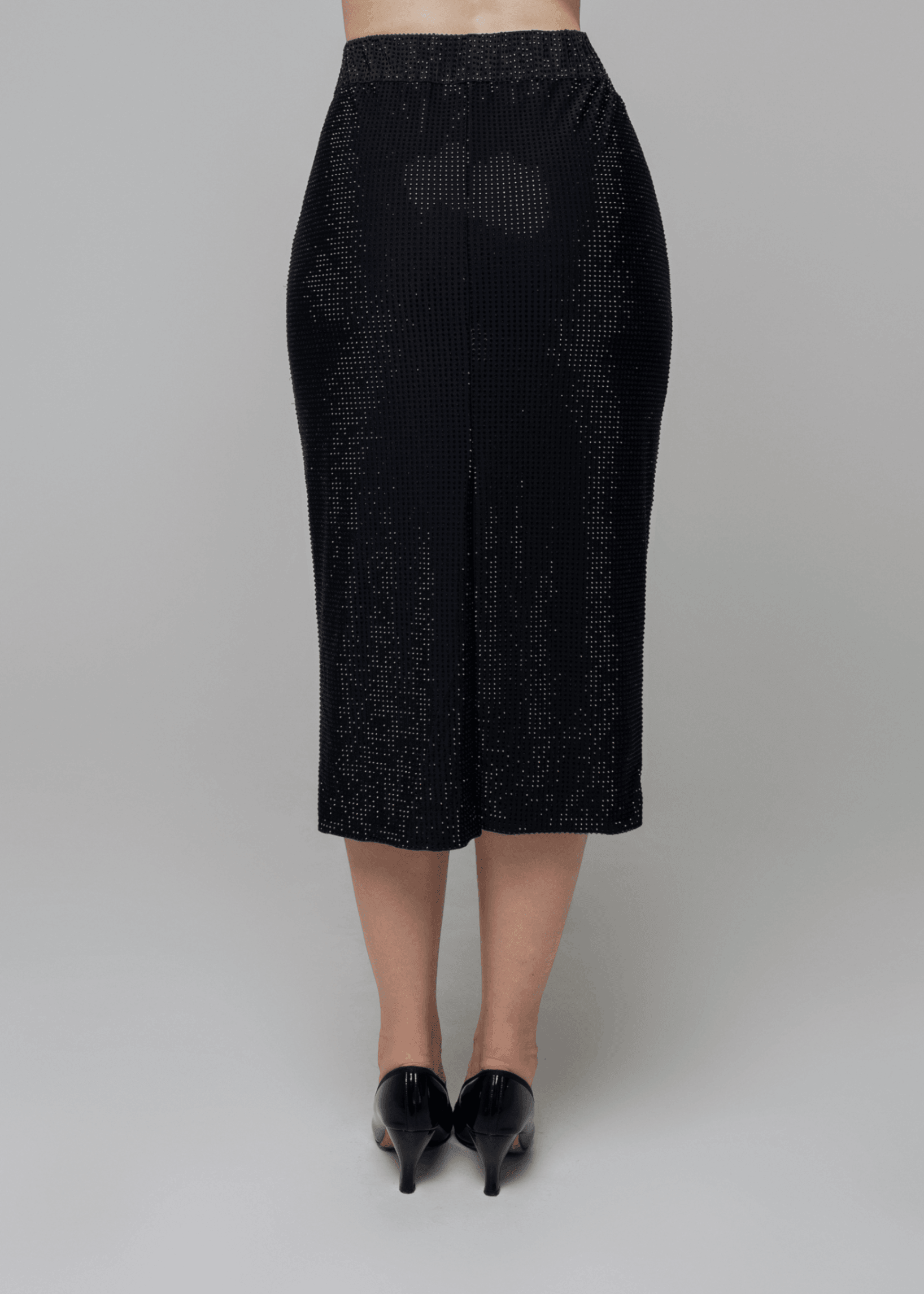 Exquisite detail of Crystal Pencil Skirt showcasing the fine craftsmanship and elegant design characteristic of Axinia Collection 's luxury collection.