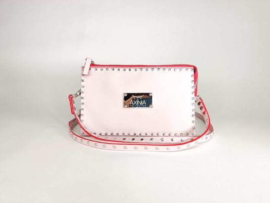 Exquisite detail of Clutch Bag With Wings and Rivets showcasing the fine craftsmanship and elegant design characteristic of Axinia Collection 's luxury collection.
