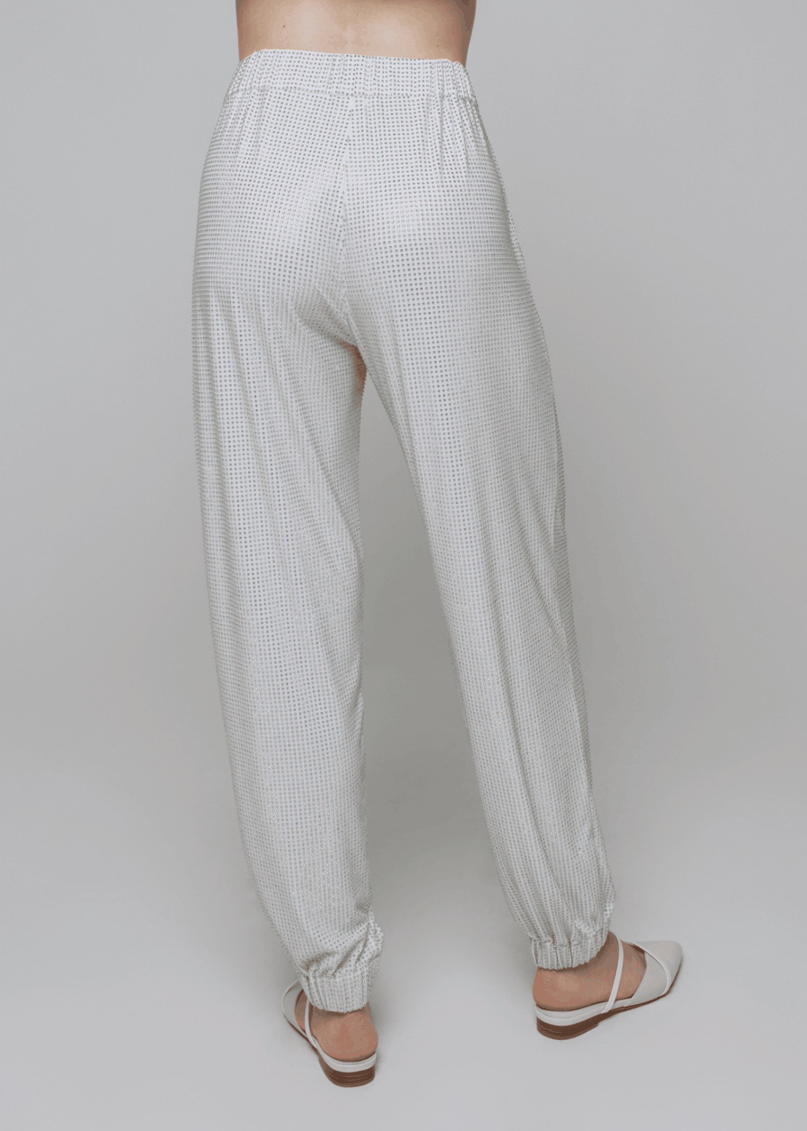 Exquisite detail of Axinia Crystal Harem Pants showcasing the fine craftsmanship and elegant design characteristic of Axinia Collection 's luxury collection.