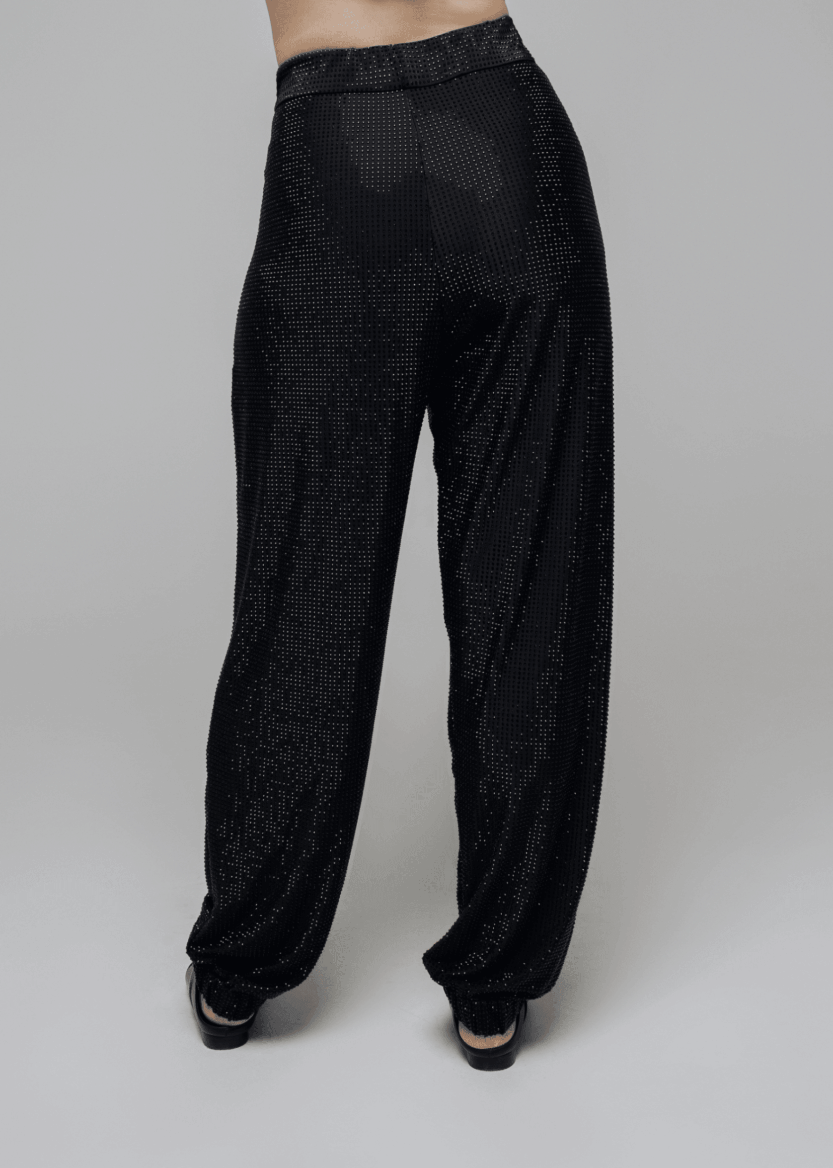 Exquisite detail of Crystal Harem Pants showcasing the fine craftsmanship and elegant design characteristic of Axinia Collection 's luxury collection.