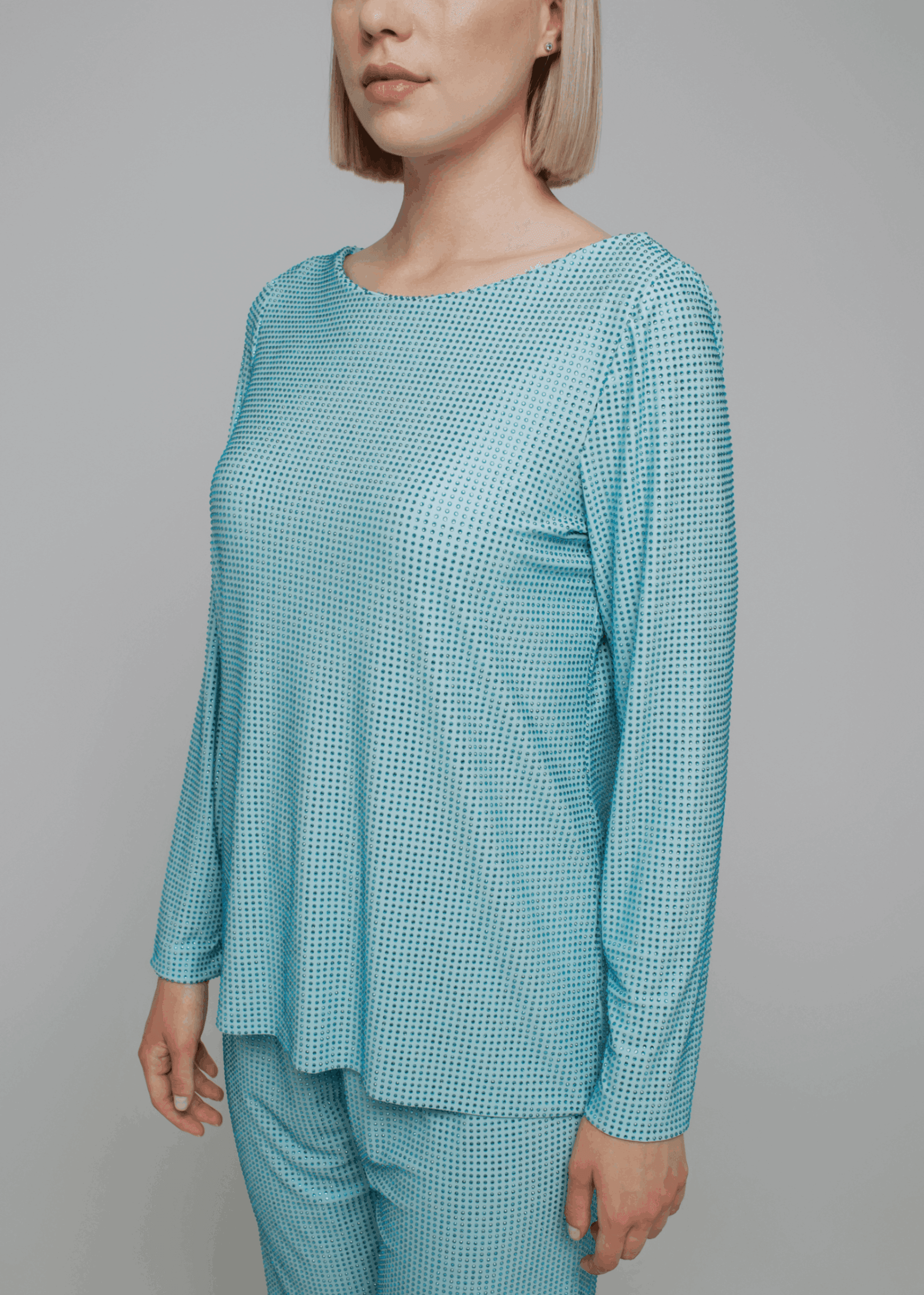 Exquisite detail of Axinia Crystal Long Sleeve Tunica Top showcasing the fine craftsmanship and elegant design characteristic of Axinia Collection 's luxury collection.