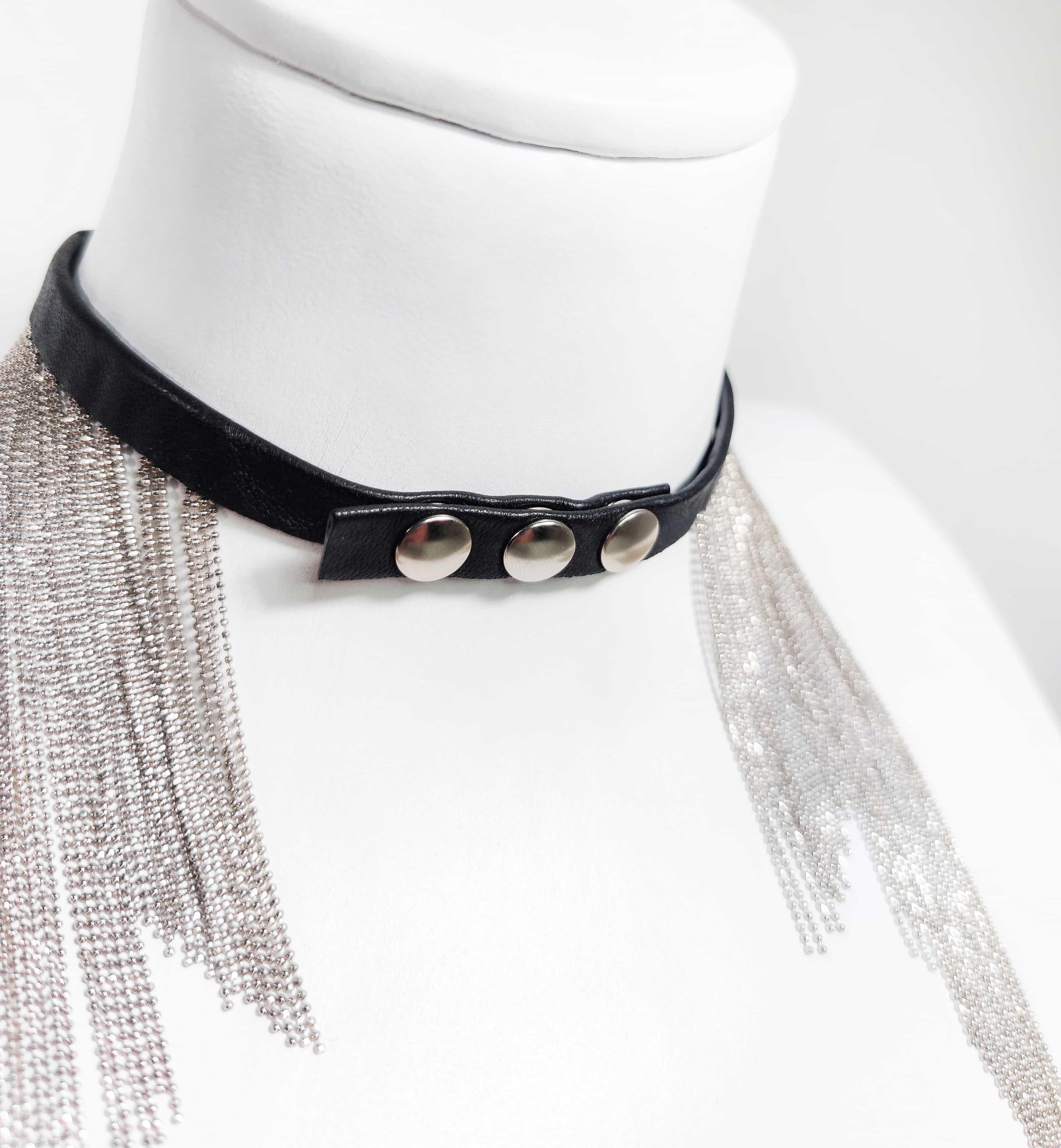 Exquisite detail of Long Leather Chocker with Chains showcasing the fine craftsmanship and elegant design characteristic of Axinia Collection 's luxury collection.