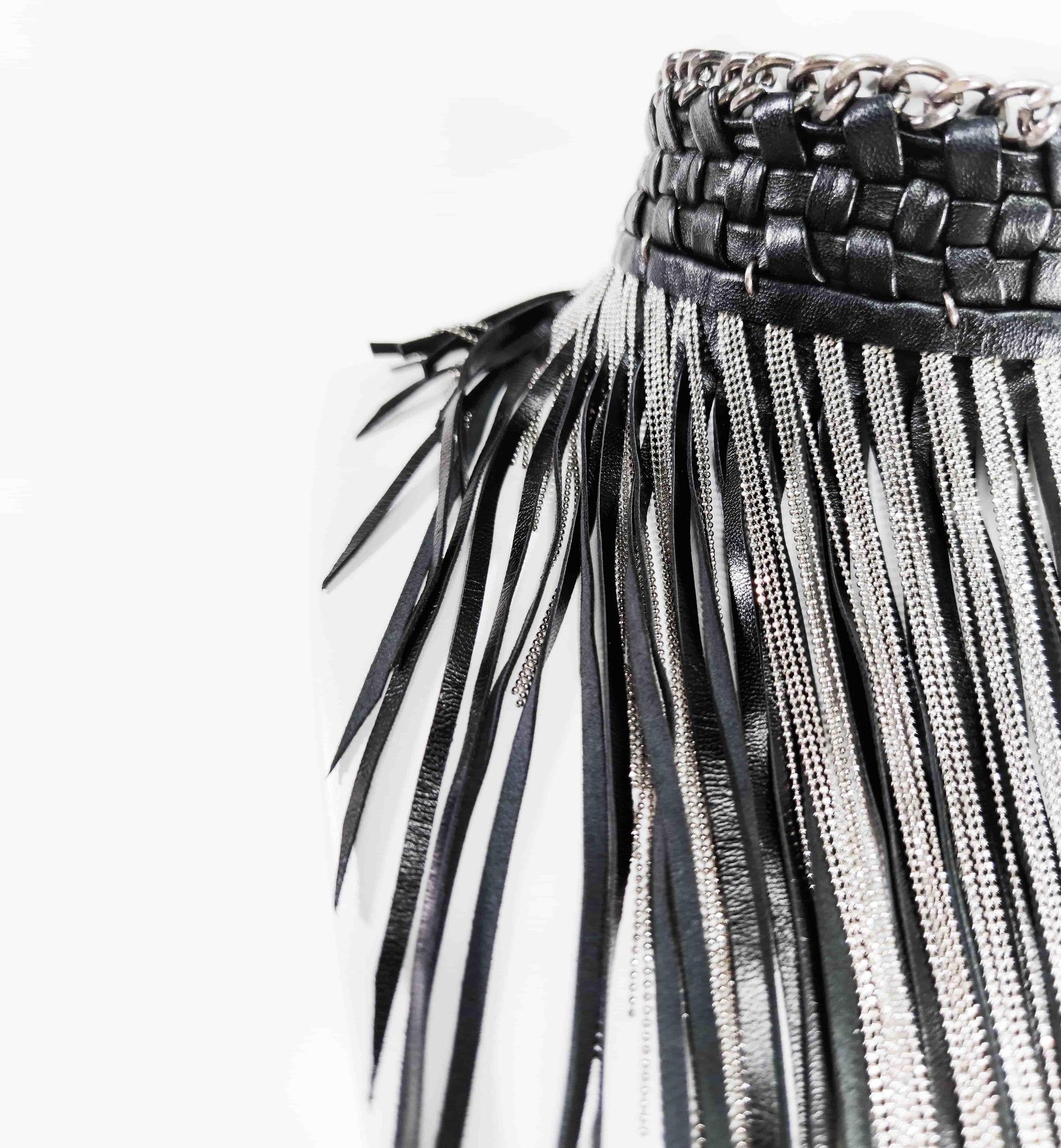 Exquisite detail of Axinia Long Braided Leather Chocker with Leather Fringe and Chains showcasing the fine craftsmanship and elegant design characteristic of Axinia Collection 's luxury collection.